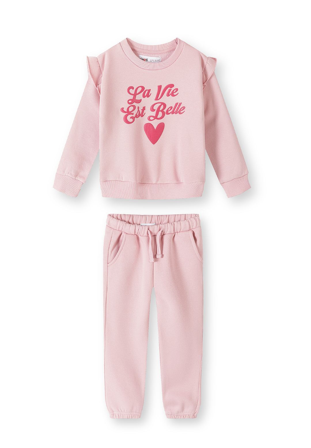 Survêtement rose à volants pour fille, composé d'un sweat-shirt et d'un pantalon de jogging, vue de face.