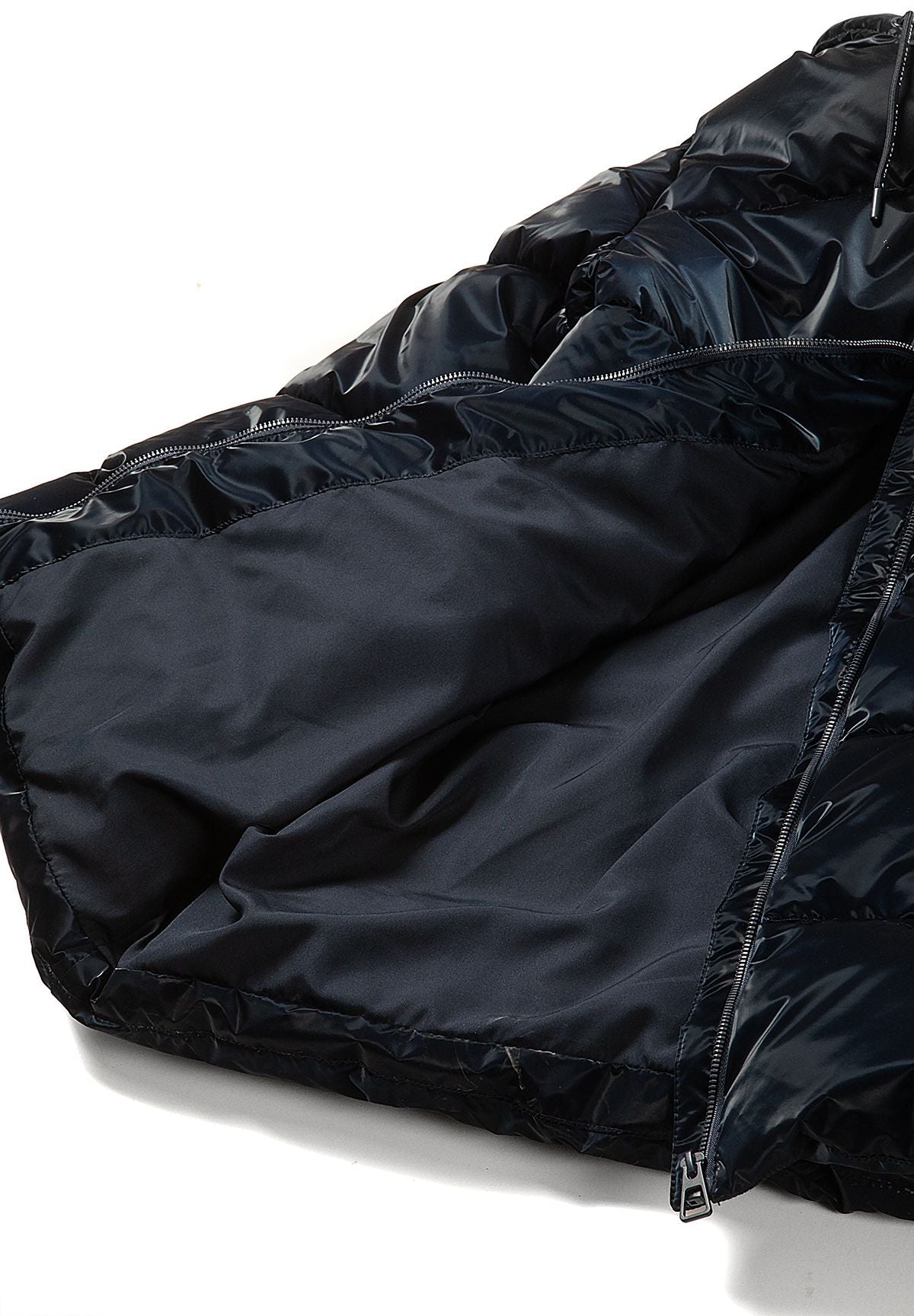Inside view of the long navy padded coat showing smooth dark body lining beneath its glossy outer shell.