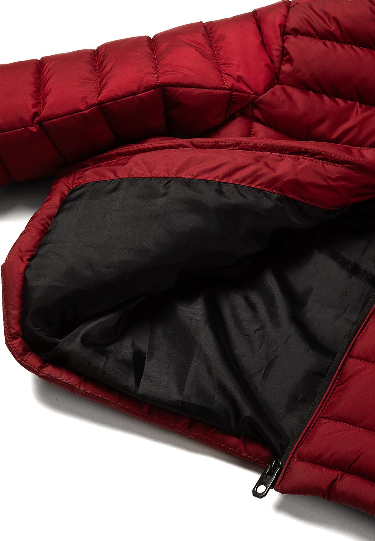 Inside view of the smooth black body lining in the deep red padded jacket.