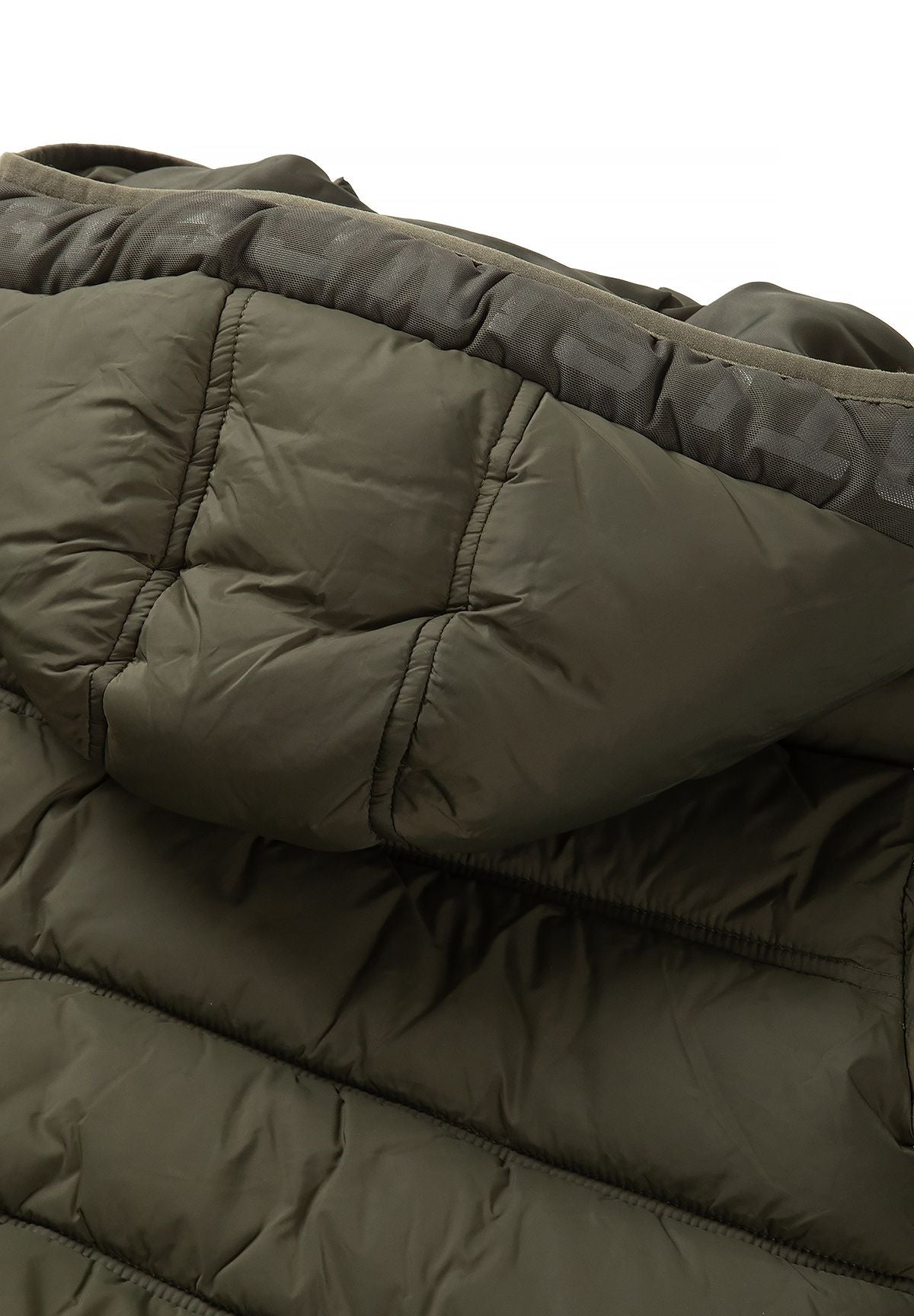 Detail of the khaki padded hood rim with a darker tonal printed band.