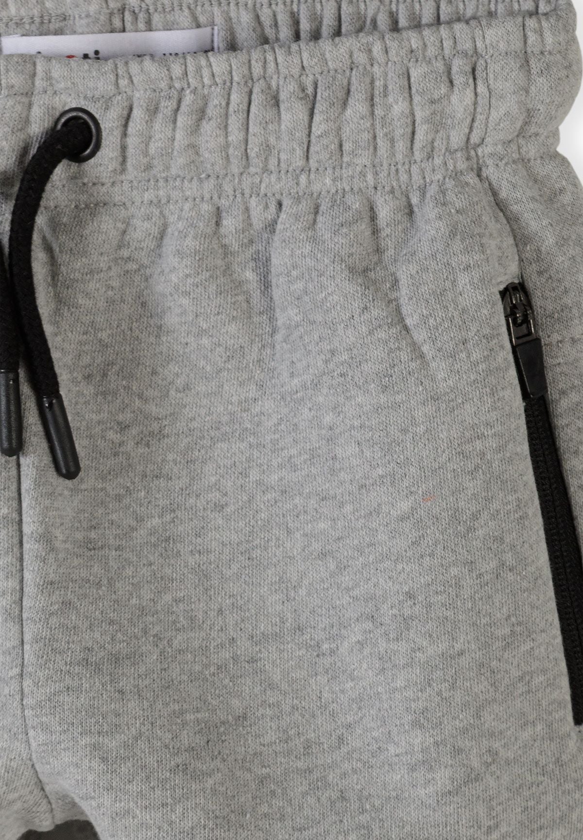 Slim-fit joggingbroek voor jongens in marineblauw en grijs met zakken met rits (set van 2), detail van de grijze tailleband en de zak met rits.