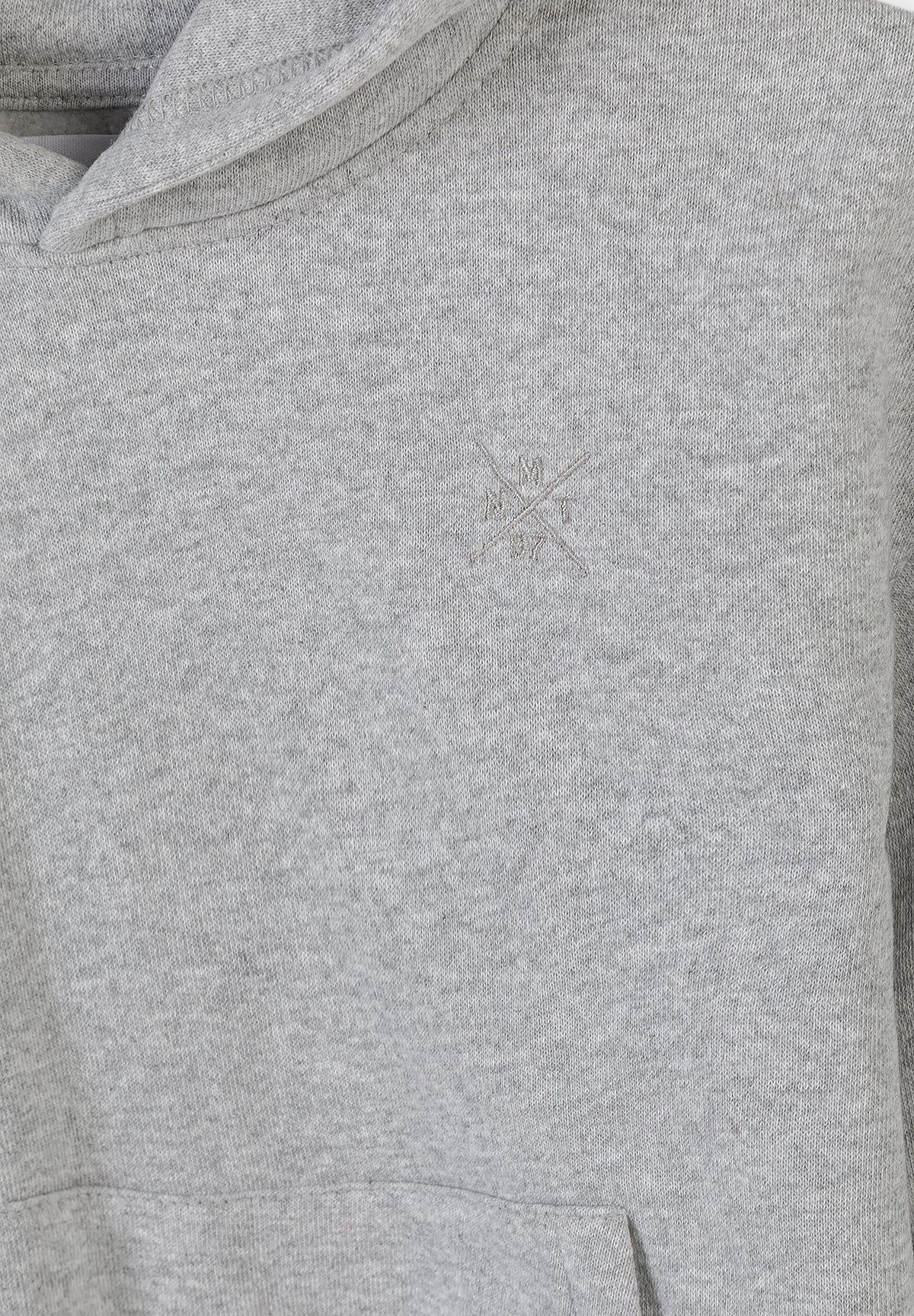 Close-up of heather grey hoodie pocket edge and tiny crossed chest embroidery.