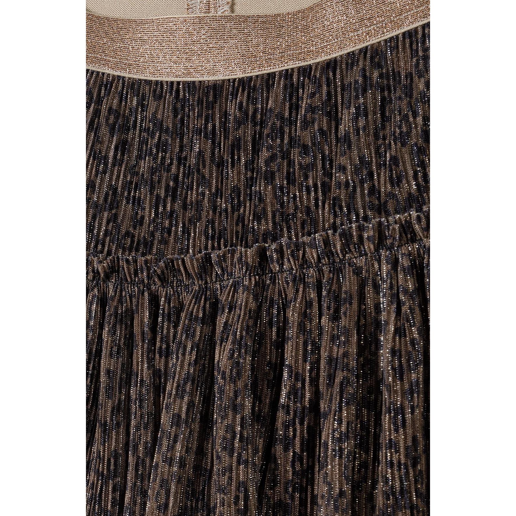 Close-up detail of brown sparkle fabric showing glitter texture and pleated construction with elastic waistband
