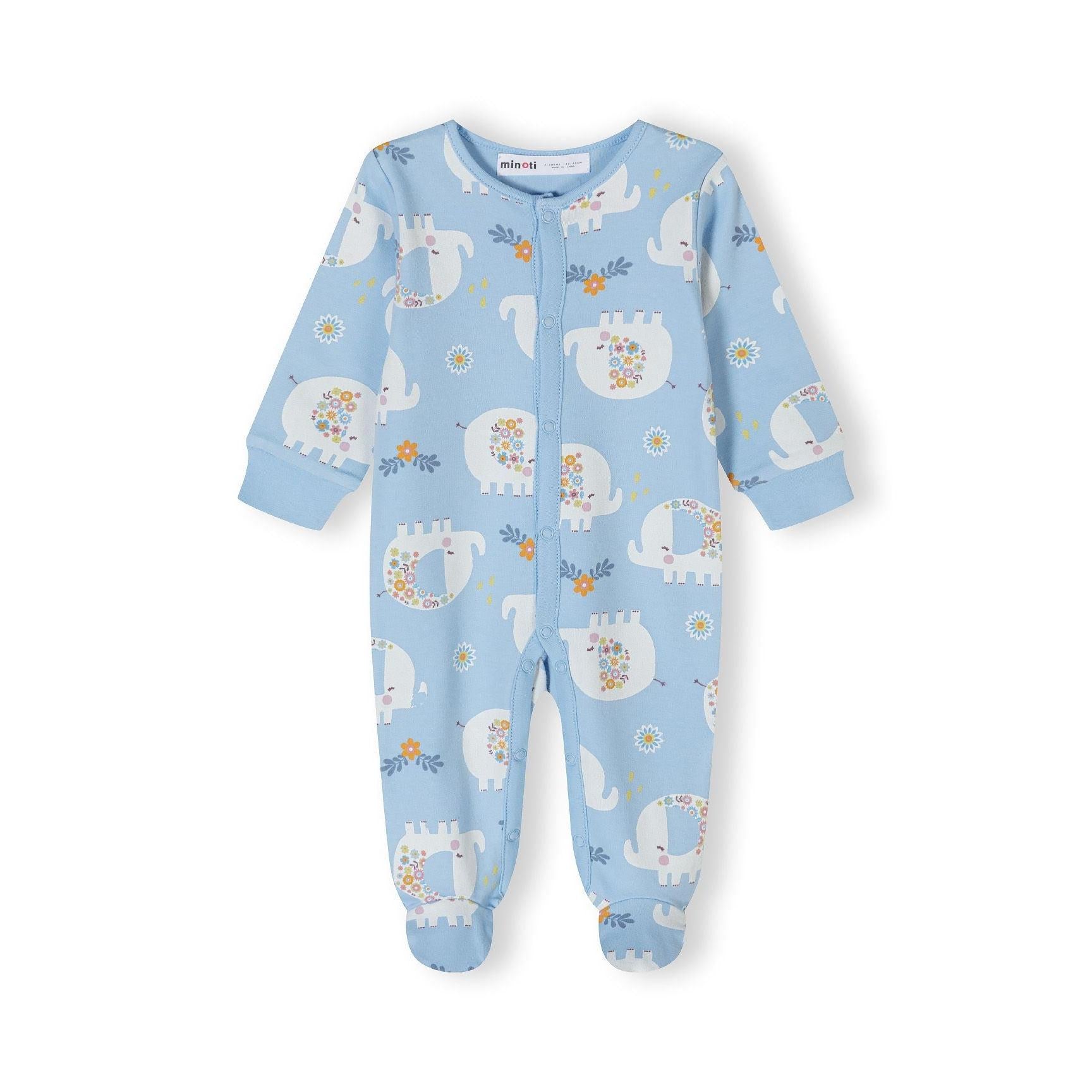 Close-up of light blue sleepsuit with white elephant pattern and floral details, showing snap button closure and Minoti label
