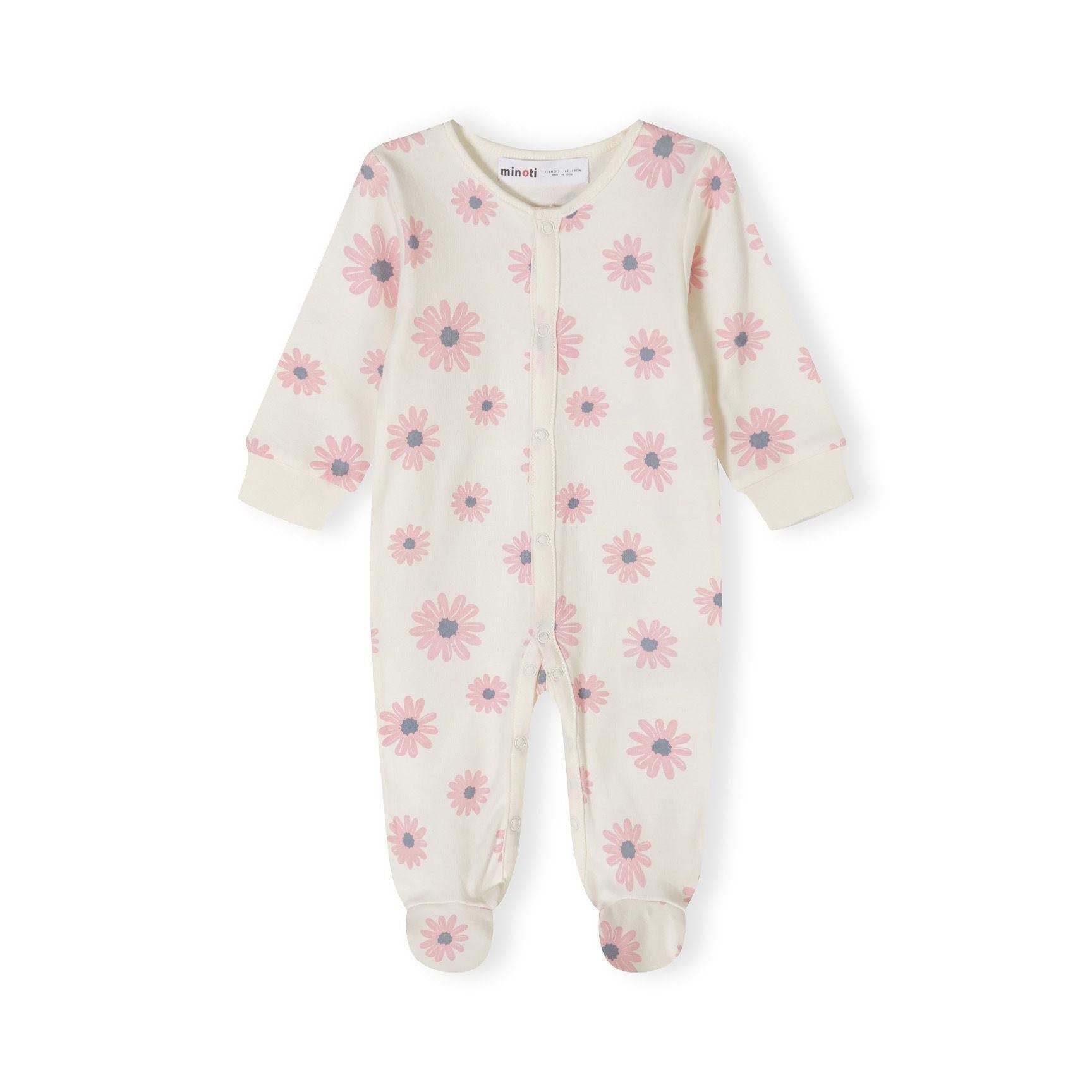 Detail view of pink sleepsuit showing snap button closure, small white elephant design with colourful flowers and Minoti label