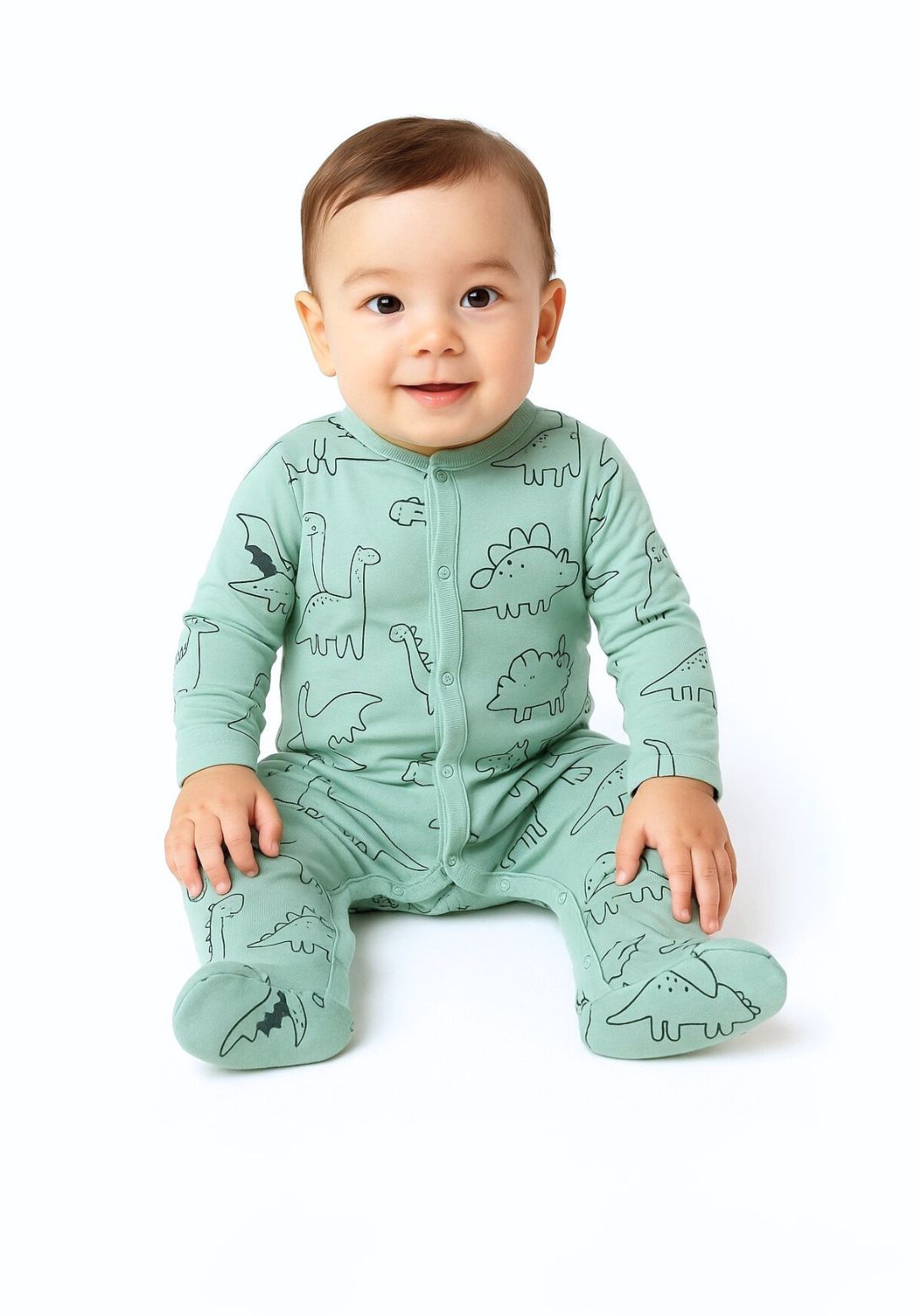 Boys long sleeve sleepsuit in mint with dinosaur print, front view.