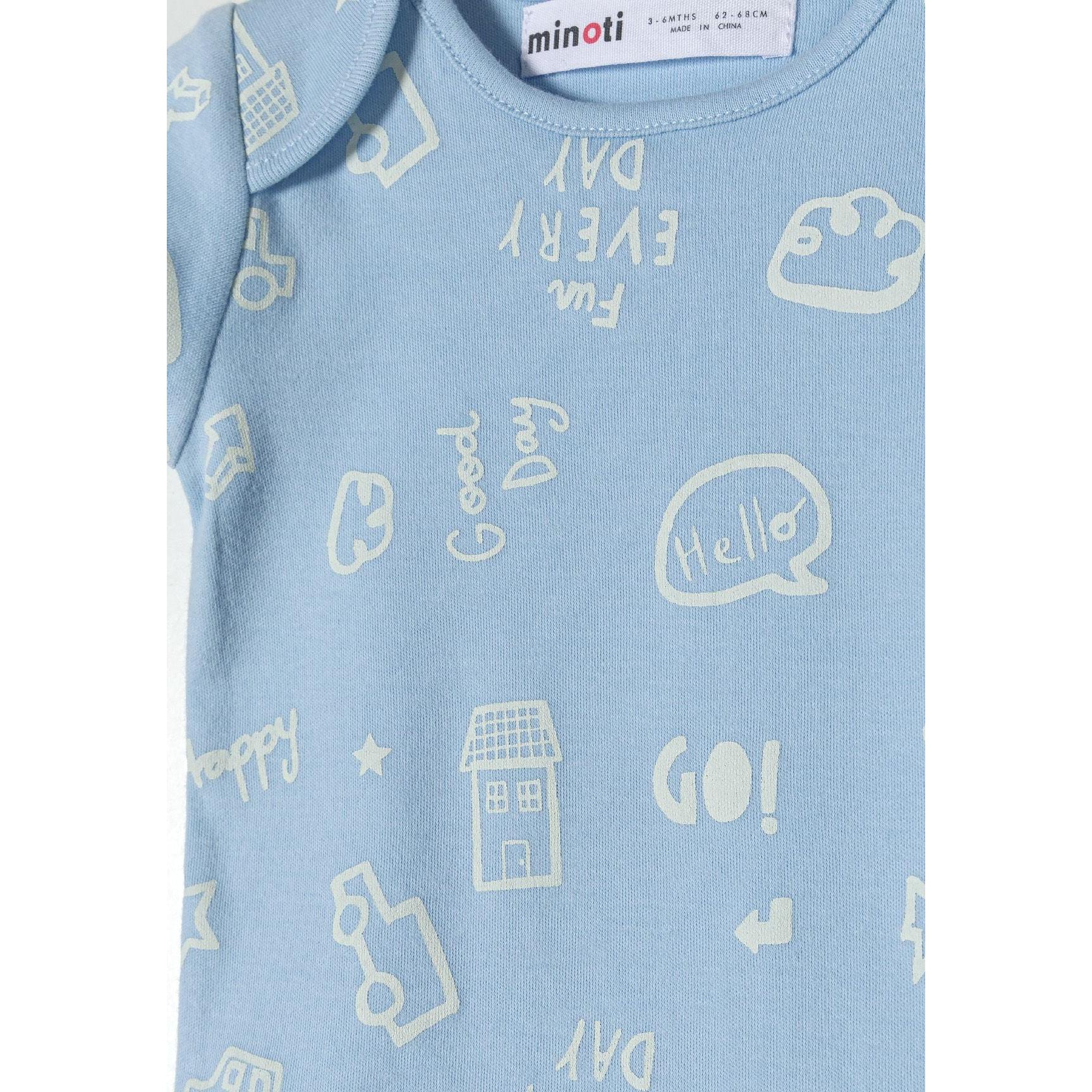 Close-up detail of light blue bodysuit showing Minoti label and various printed graphics including text and icons scattered across the fabric