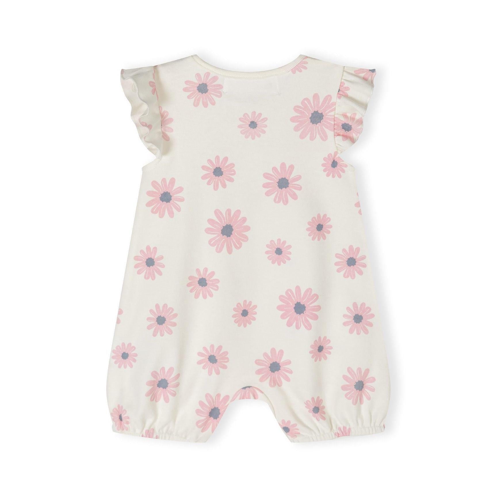 Detail shot of light pink romper showing elephant family print with 'I Love My Family' text and colorful flower accents on pink fabric