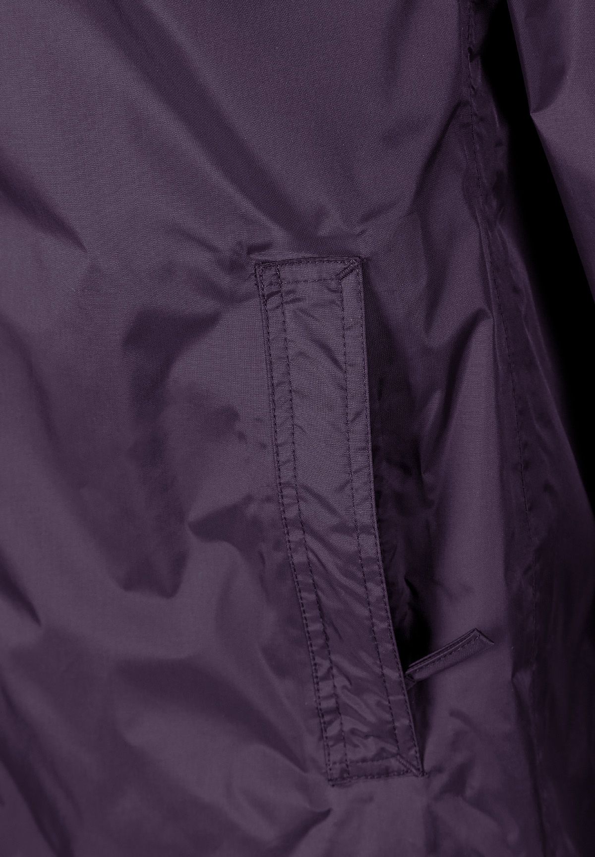 Detail of a purple women's waterproof jacket showing a zipped pocket.