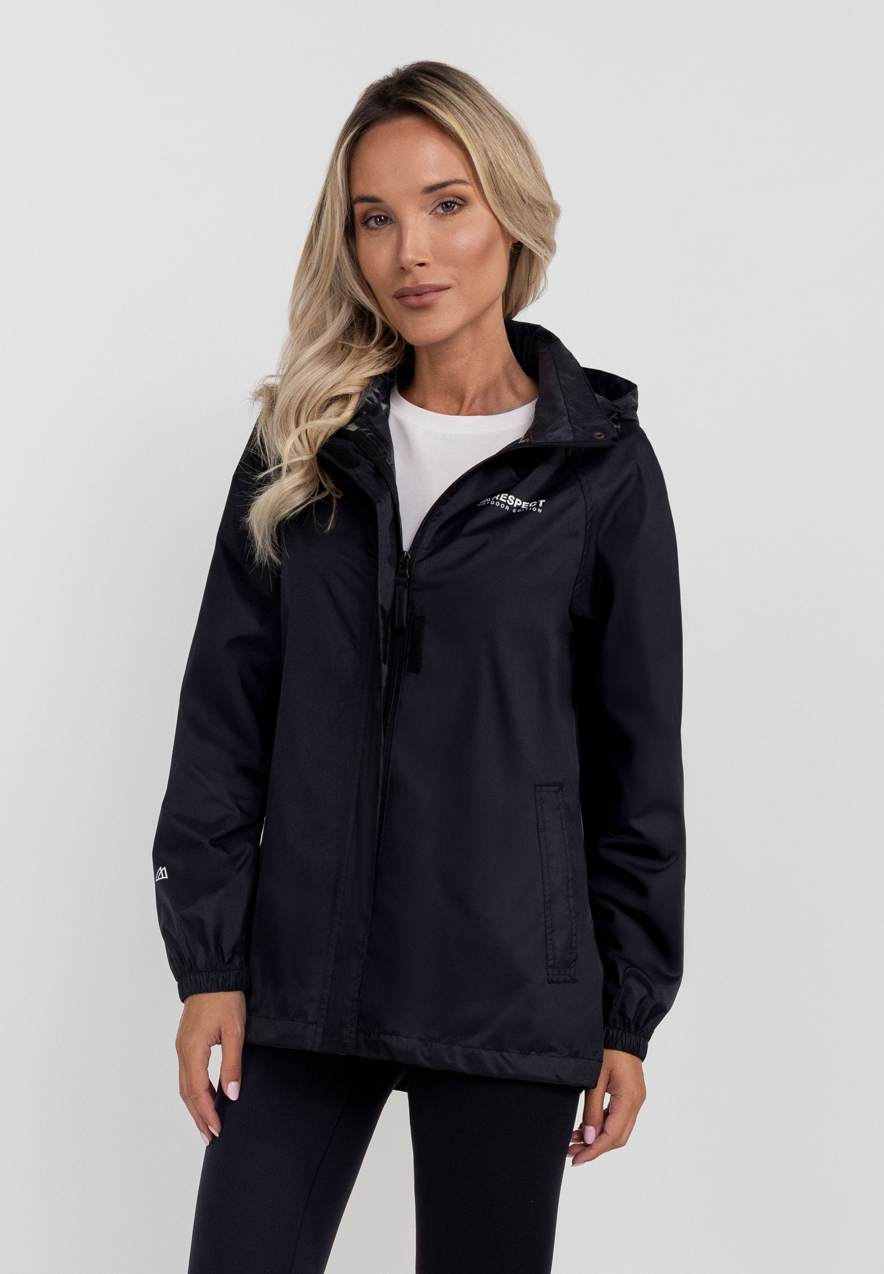 Front view of a women's black packaway waterproof jacket with a hidden hood and zippered pockets.