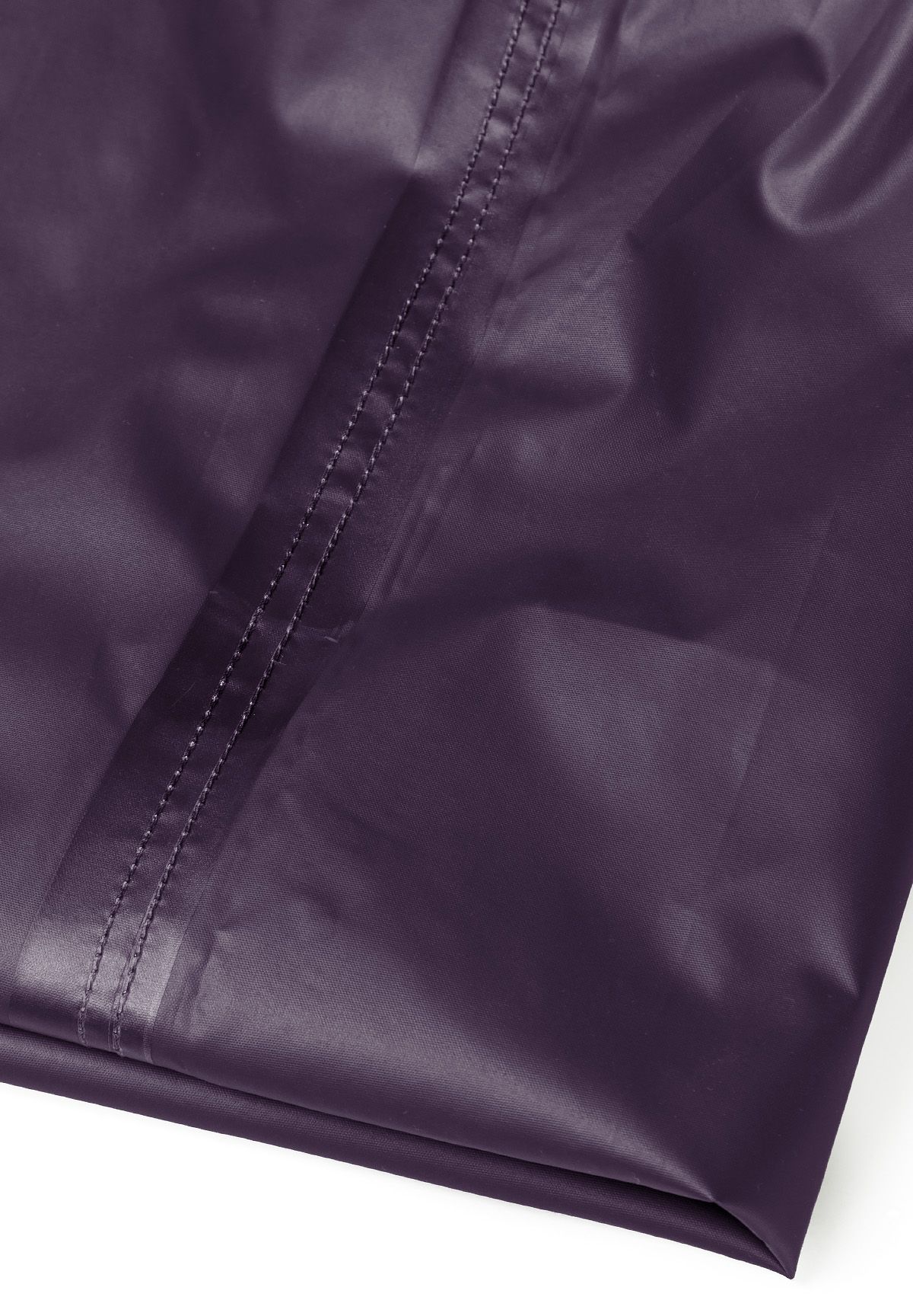 Detail of purple waterproof overpants with visible stitching.