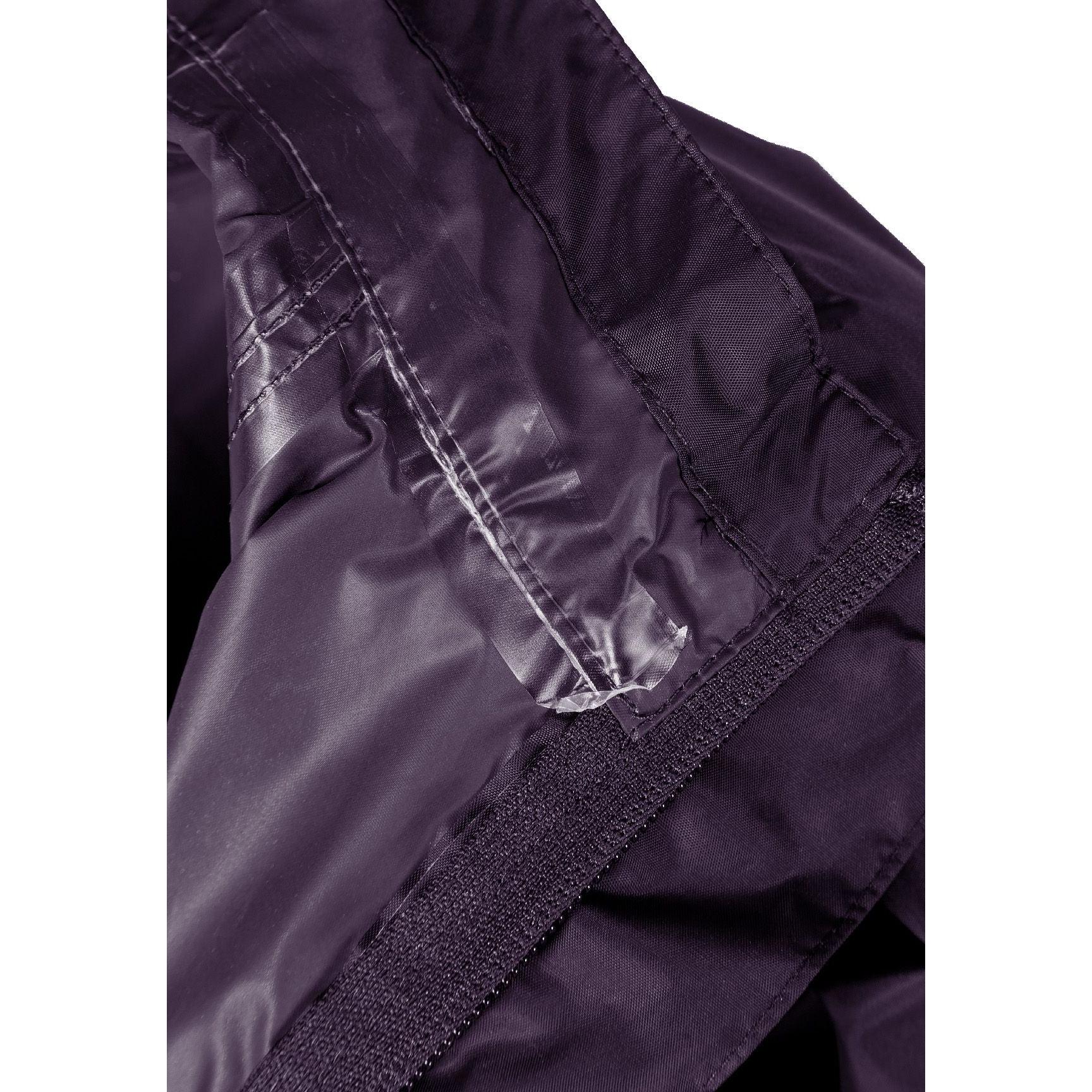 Interior view of purple waterproof jacket showing internal pocket with zipper closure in matching purple fabric
