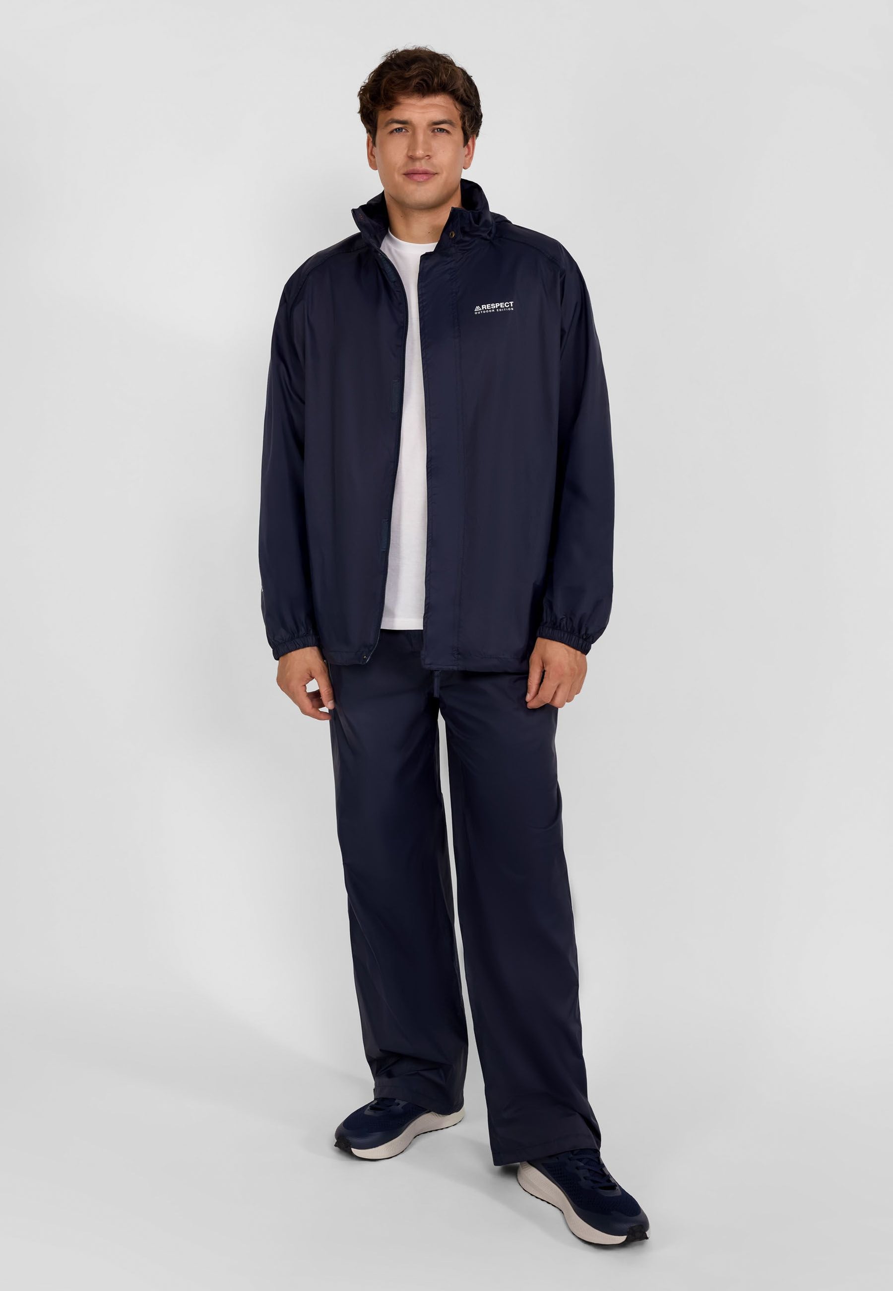 Men's navy waterproof overpants with elastic waistband and adjustable cuffs.