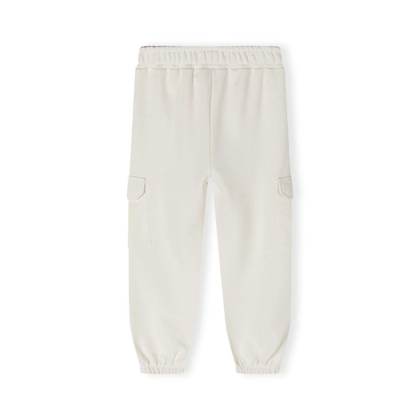 White fleece cargo joggers laid flat showing full length with elastic waistband and cargo pockets on legs