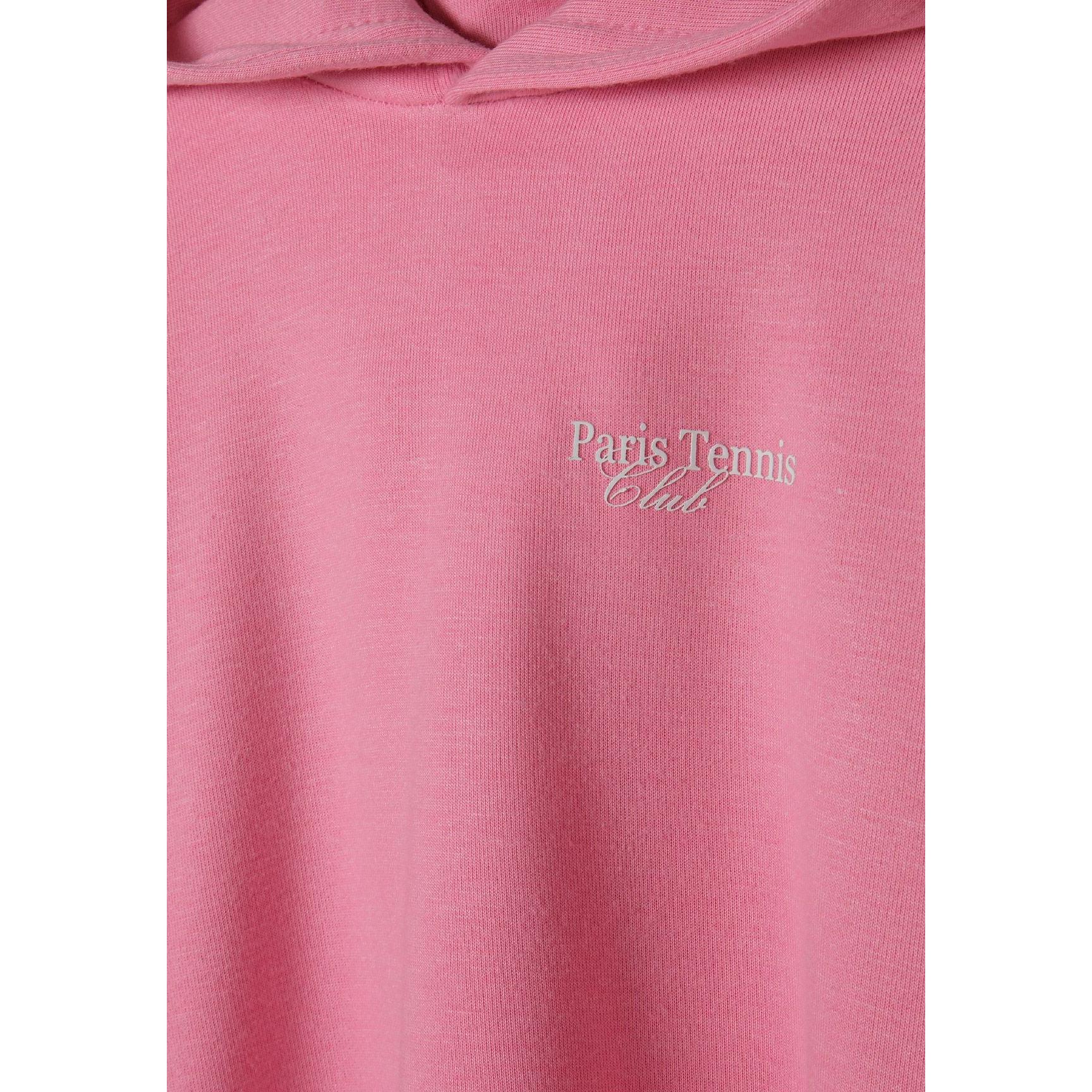 Close-up detail of pink shorts showing side pocket with 'Paris TeamGirl' text printed along the seam