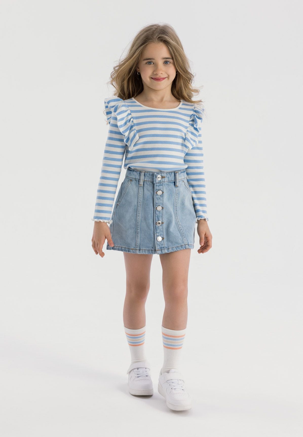 Light blue denim skirt, worn front.