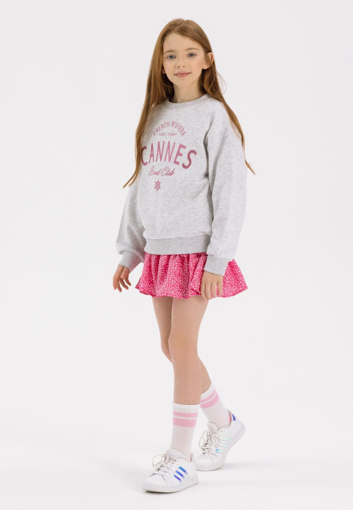 Pink and white frill skirt, worn front.
