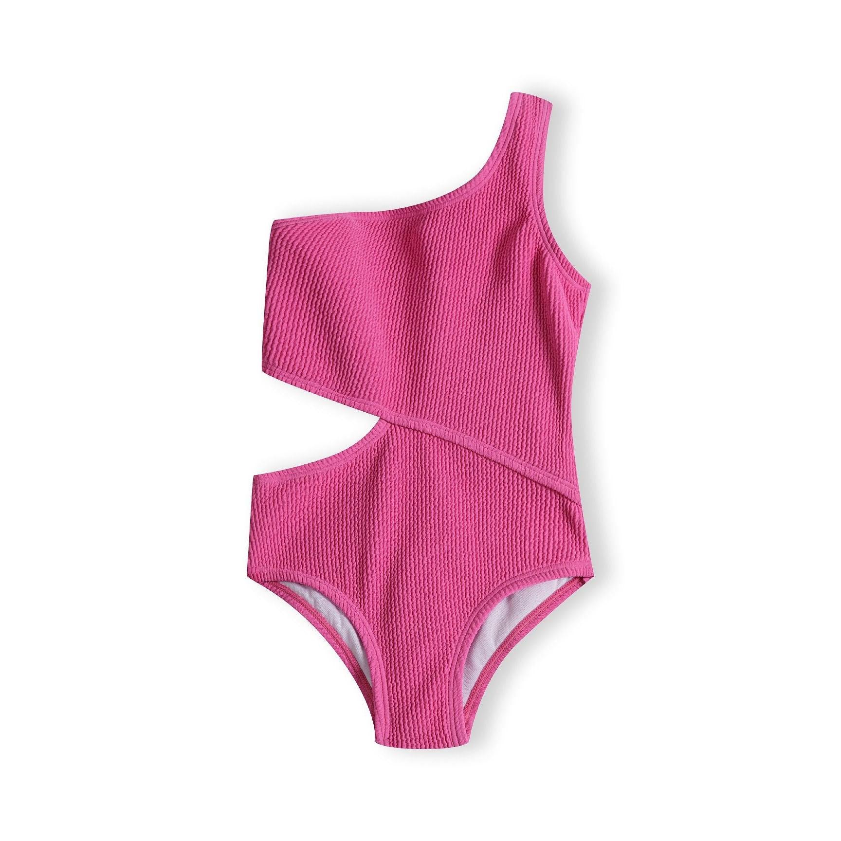 Pink ribbed one-piece swimsuit with asymmetric cutout design laid flat on white background showing front view