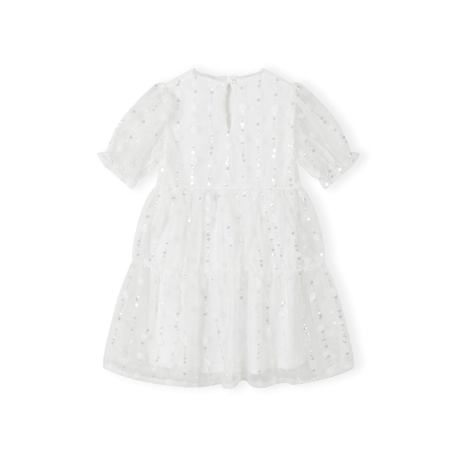 Back view of white tulle dress with sequin flowers showing button closure at neck, short sleeves and tiered skirt design