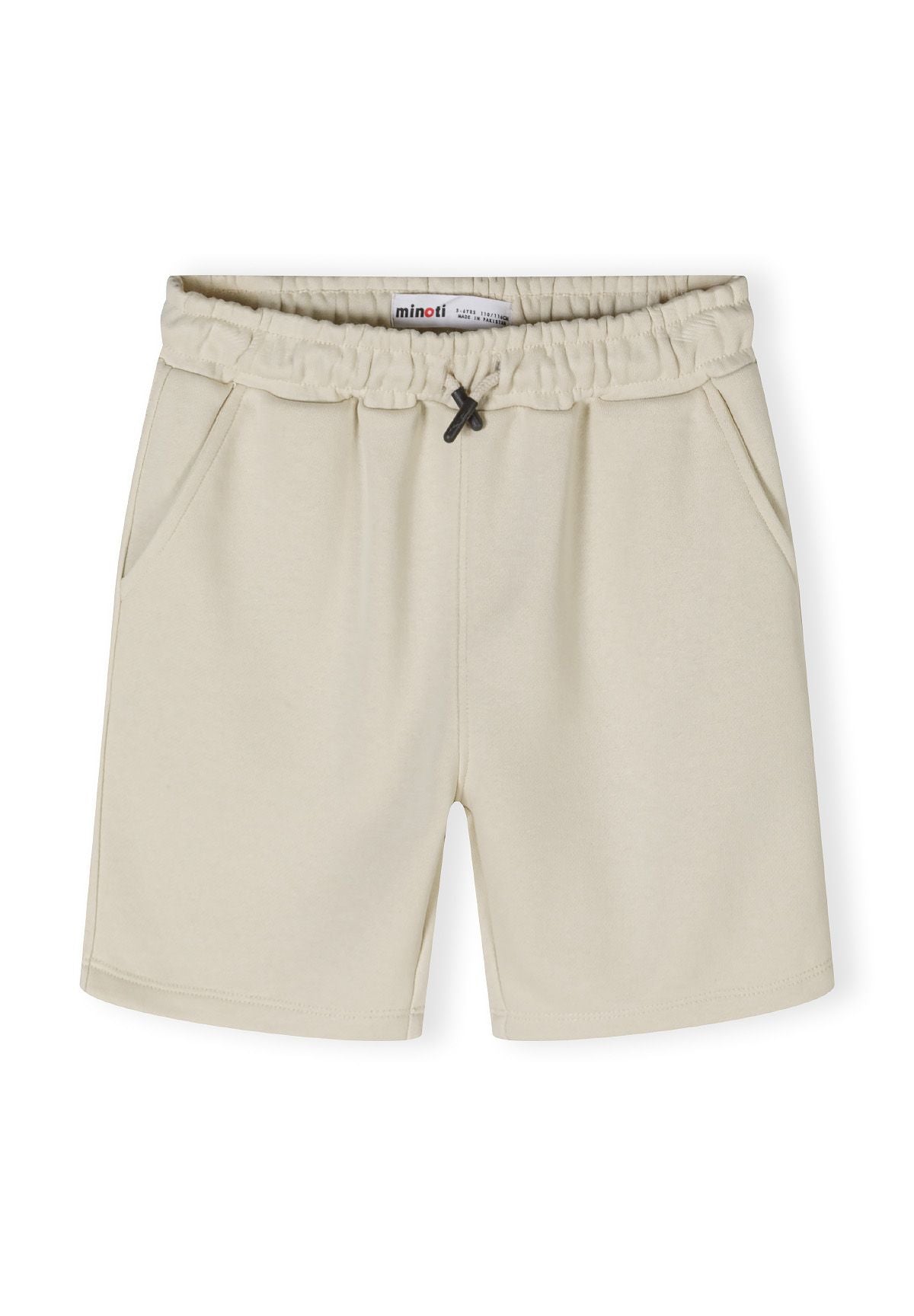 Detail of boys shorts with elastic waistband and drawstrings, featuring side pockets.