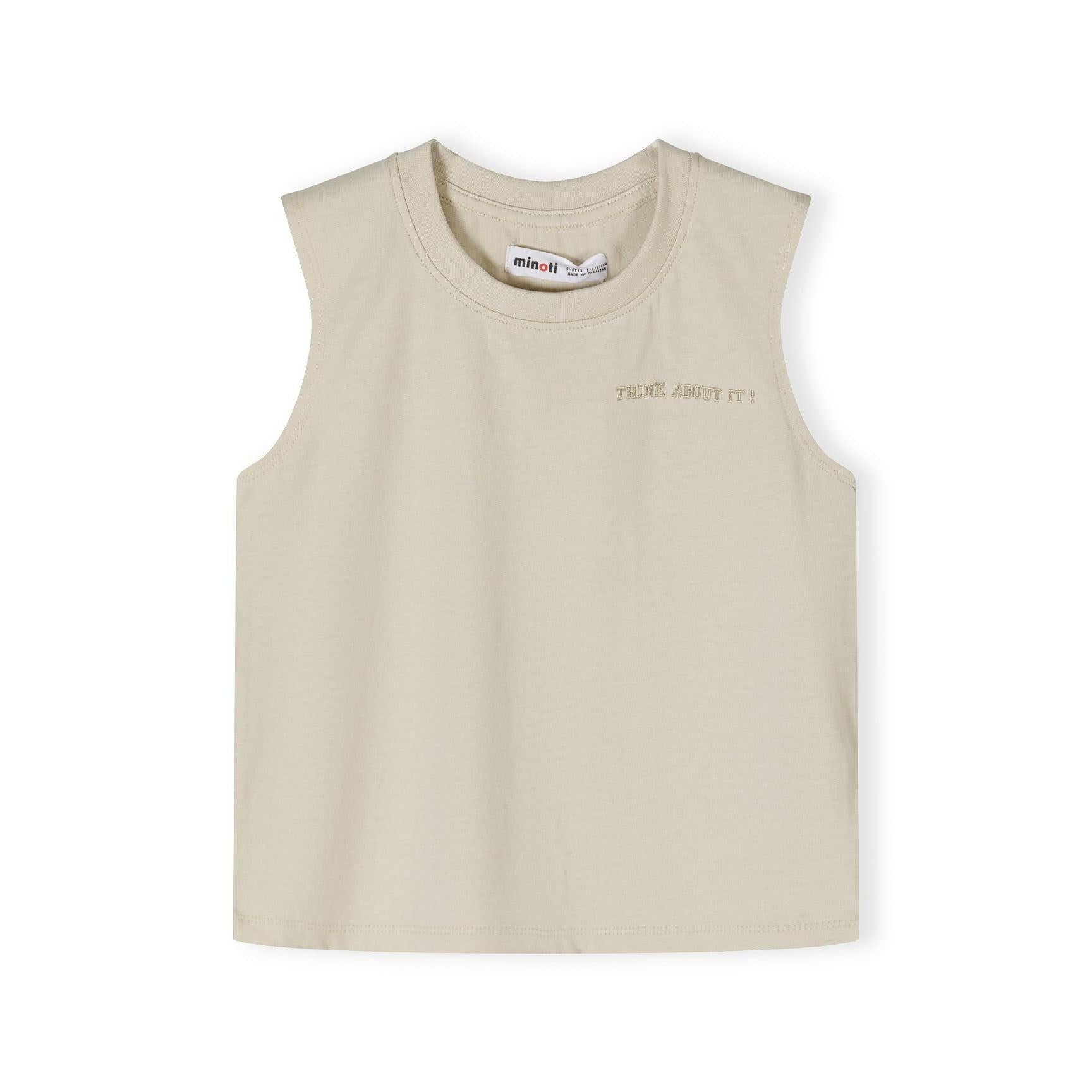 Close-up detail of beige shorts waistband showing elasticated fabric and black drawstring toggle