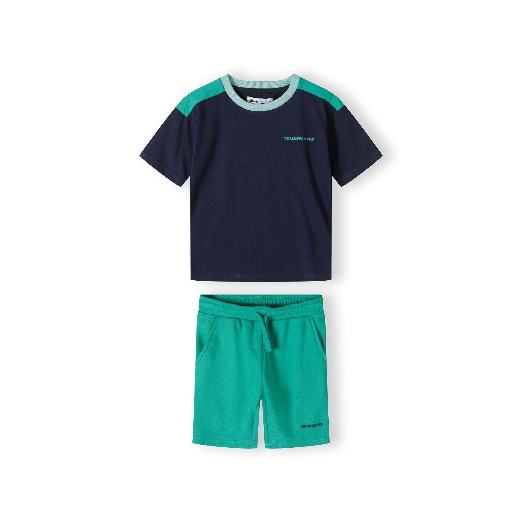 Back view of navy t-shirt showing mint green shoulder panels and contrasting trim details on white background