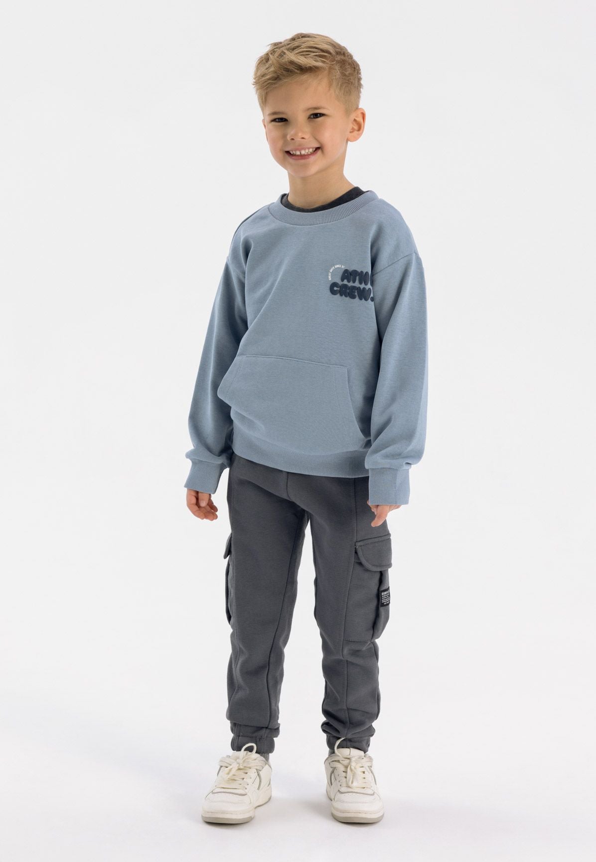 Boys grey cargo joggers with side pockets, relaxed fit.