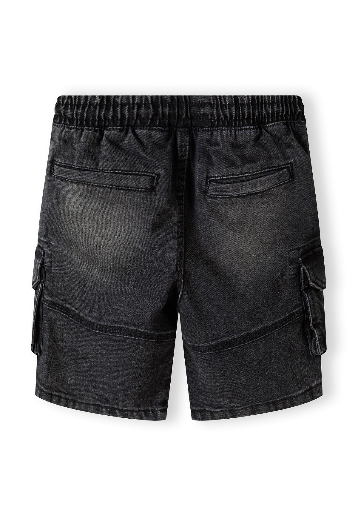Back view of black denim cargo shorts with elastic waistband and large side pockets.