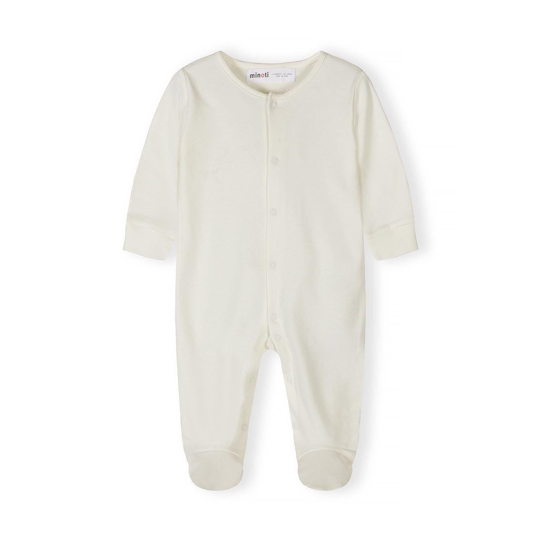 Single cream-colored baby sleepsuit with long sleeves and snap button closure shown flat against white background with Minoti branding
