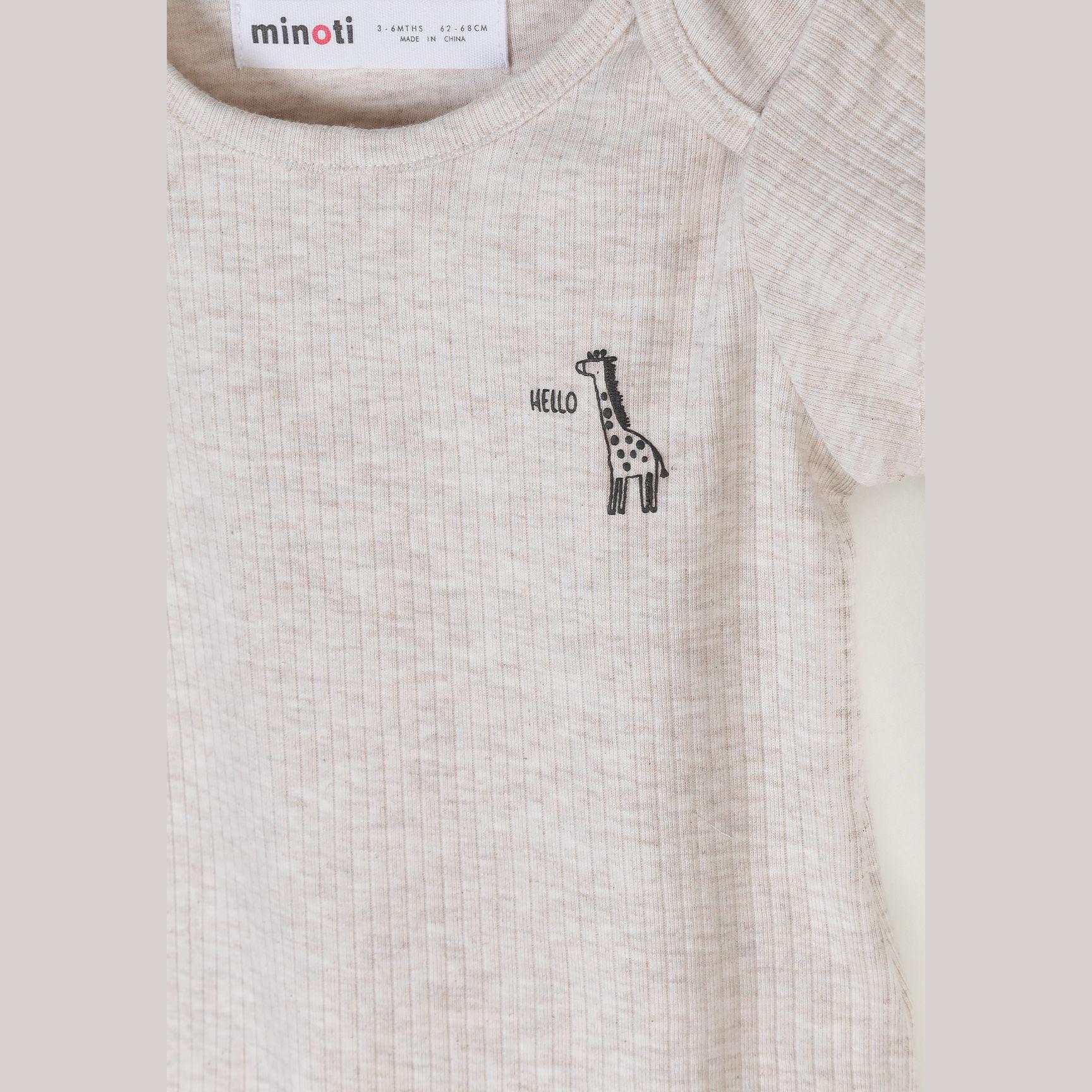 Detail view of beige ribbed bodysuit showing giraffe illustration with 'HELLO' text and fabric texture on white background
