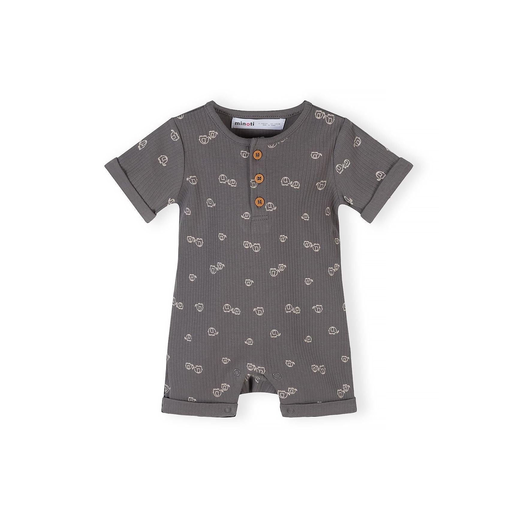 Single charcoal grey romper with white elephant print pattern and wooden button fastenings displayed against white background
