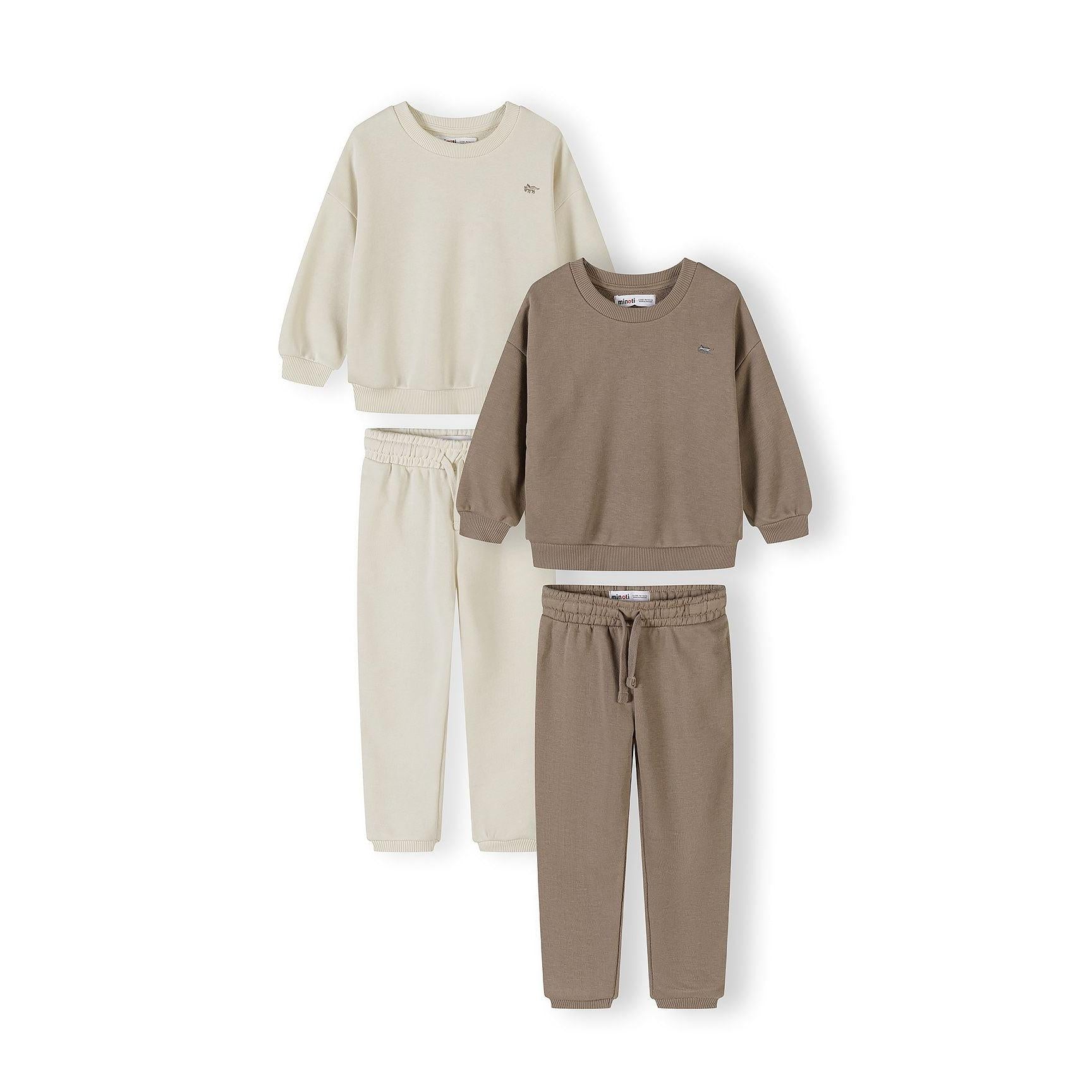 Flat lay of complete 2-pack tracksuit set showing cream sweatshirt with matching joggers and beige sweatshirt with matching joggers on white background