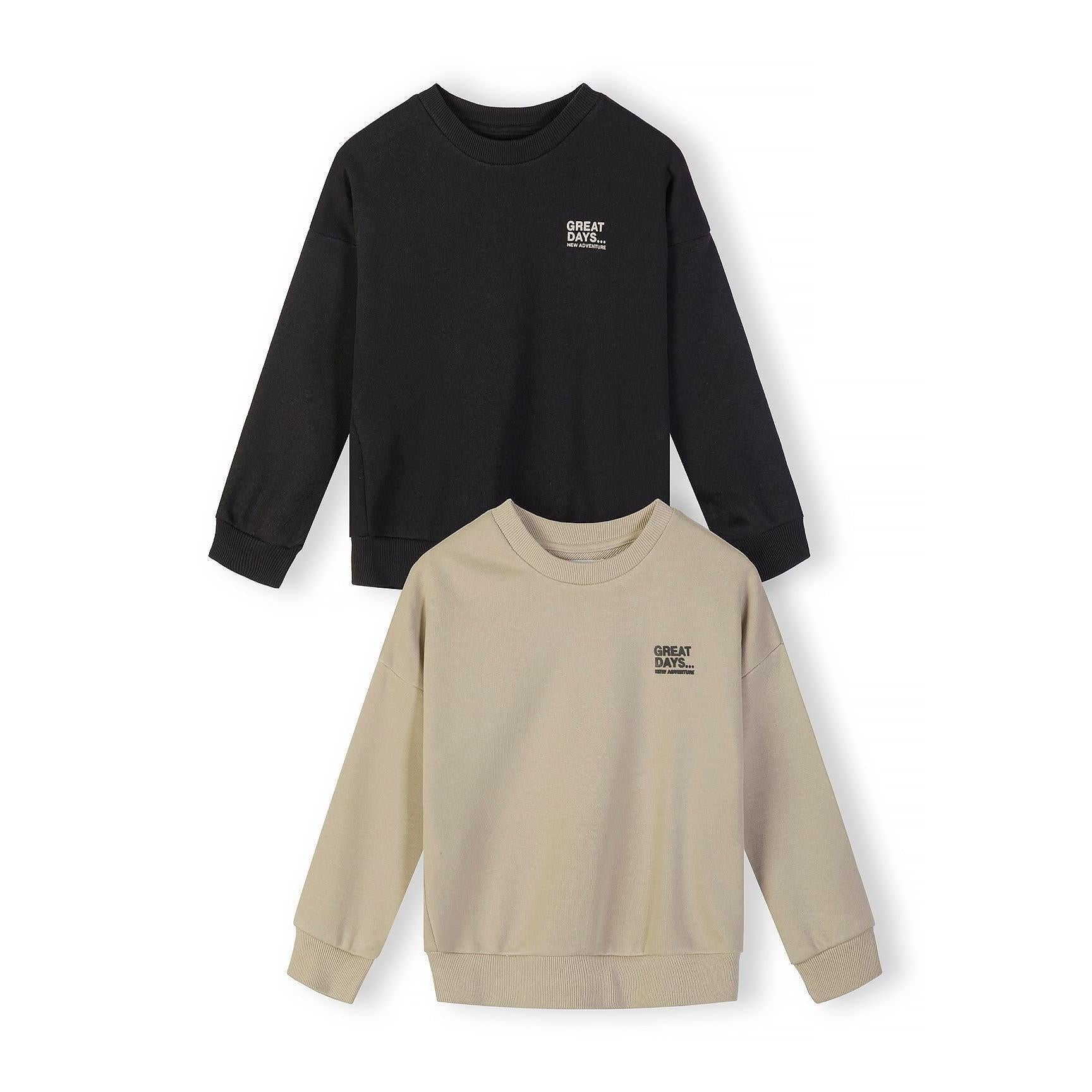 Close-up detail of beige sweatshirt showing Great Days New Adventure text print on chest area