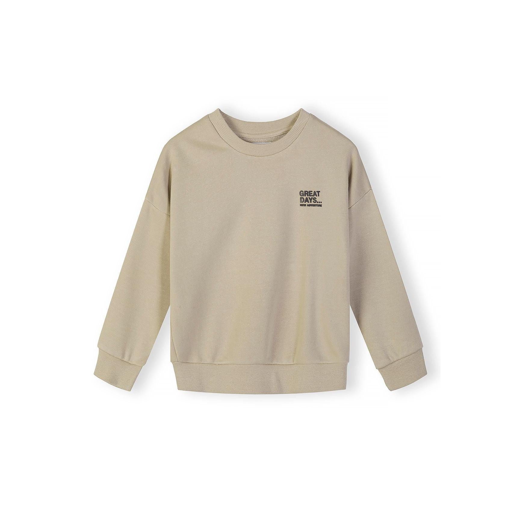 Close-up detail of beige sweatshirt showing Great Days New Adventure text print on chest area