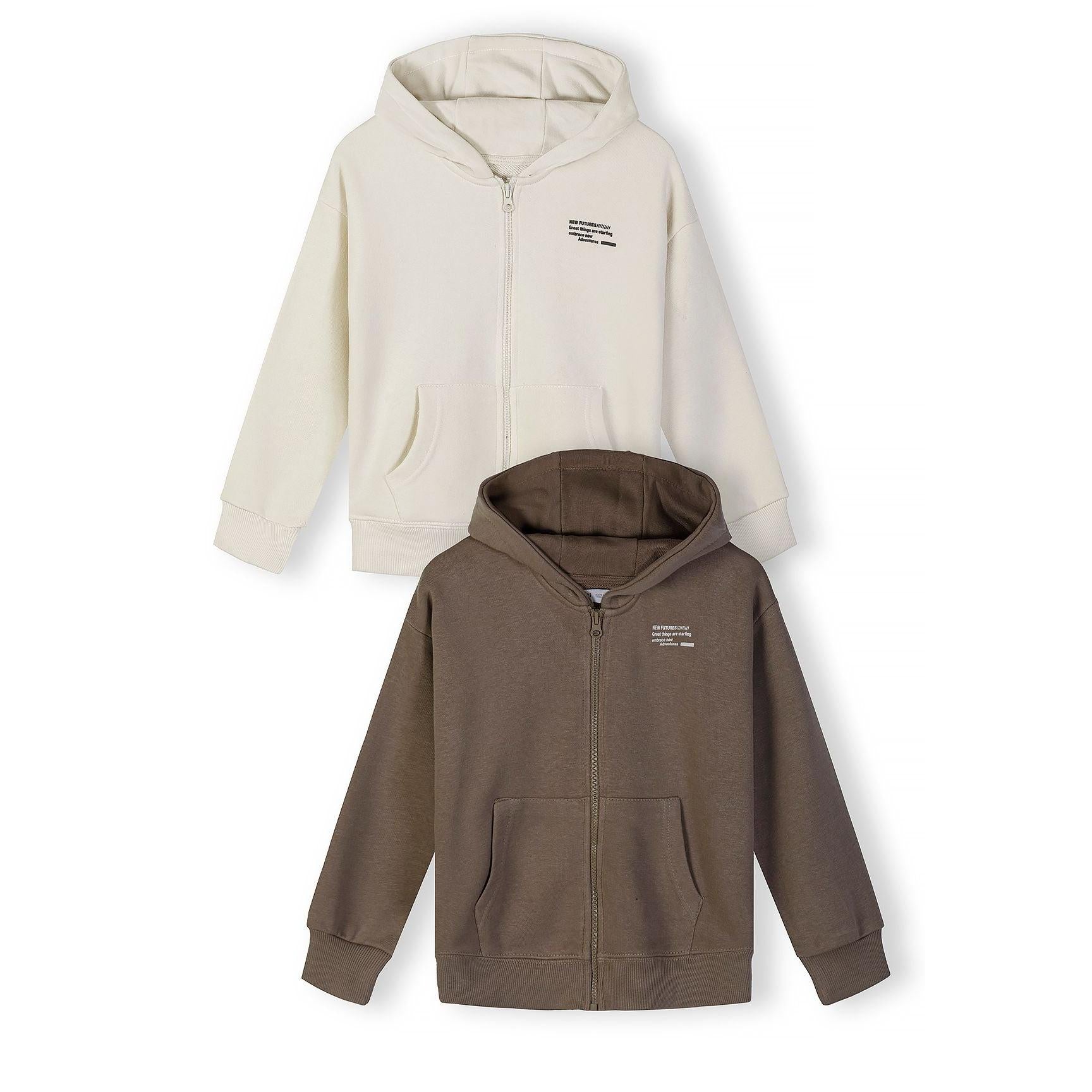 Two zip hoodies displayed on white background - cream colored hoodie on top and khaki brown hoodie below, both featuring front zip closures and kangaroo pockets