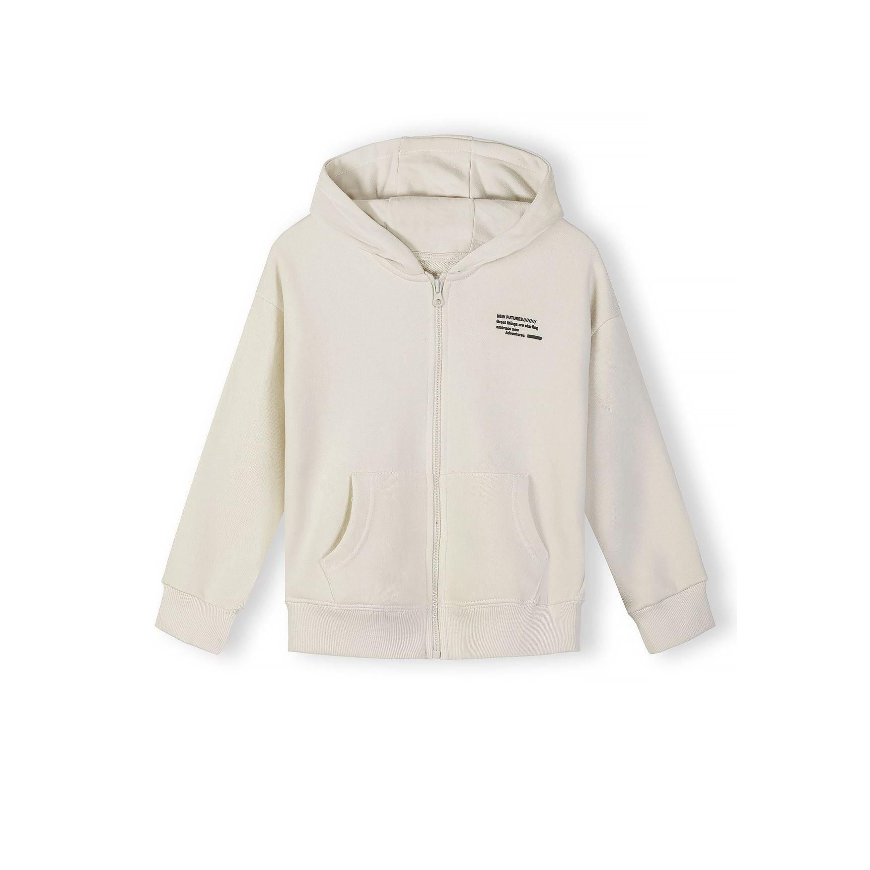 Single cream colored zip hoodie laid flat on white background showing full front view with hood, zip closure, kangaroo pocket and ribbed hem details