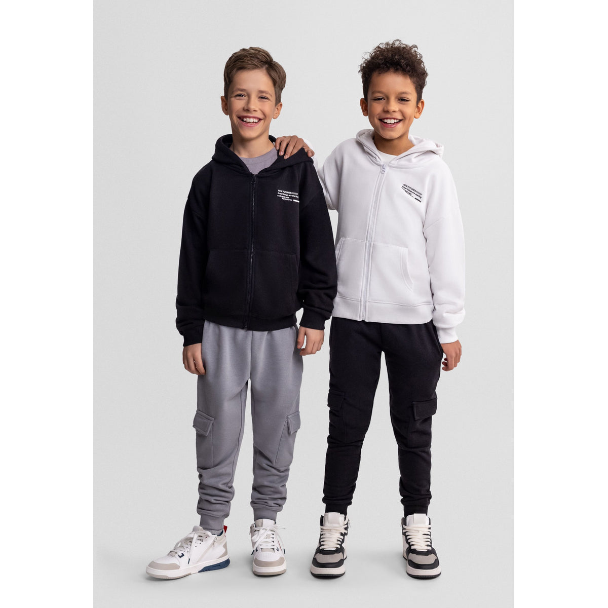 Kids' zip-up hoodies 2-pack in black and white — complete product view for square Shop card