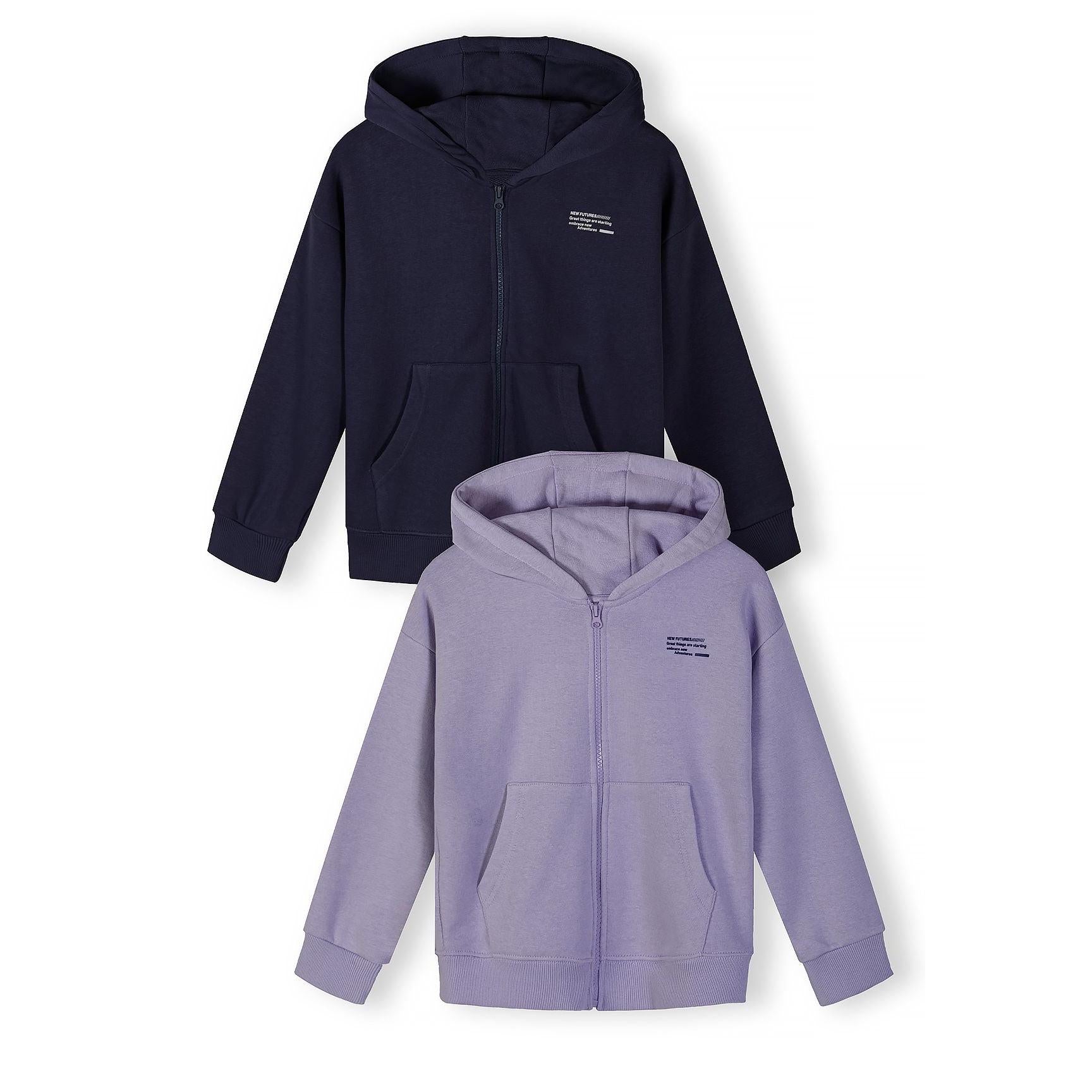 Close-up detail of navy hoodie showing zip fastening and small white text print on chest area