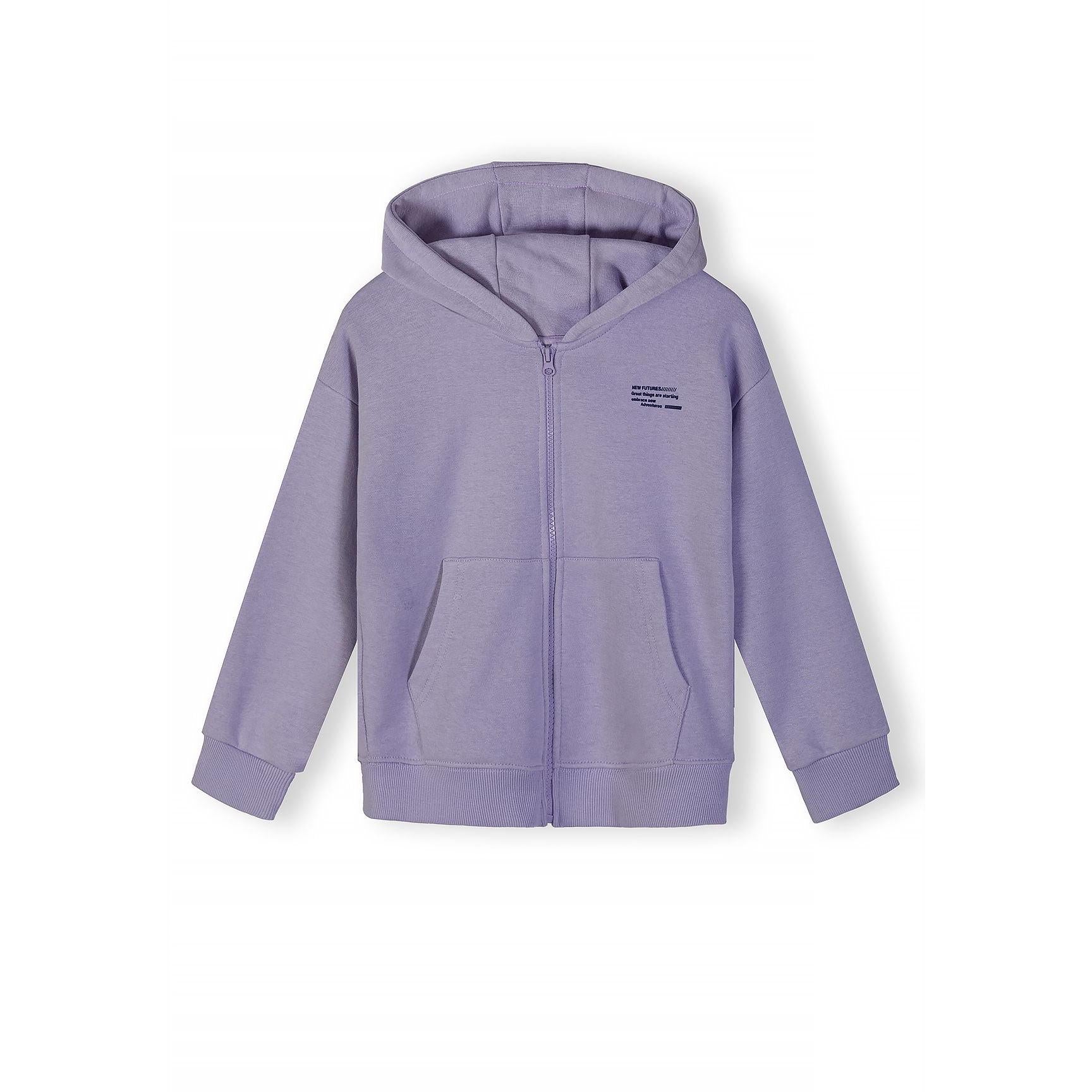 Close-up detail of navy hoodie showing zip fastening and small white text print on chest area