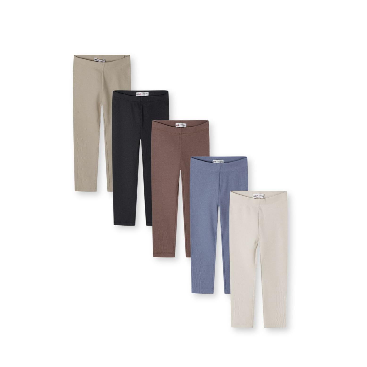 Five ribbed cotton leggings laid out in a fan arrangement showing neutral colours beige, black, brown, blue and cream against white background
