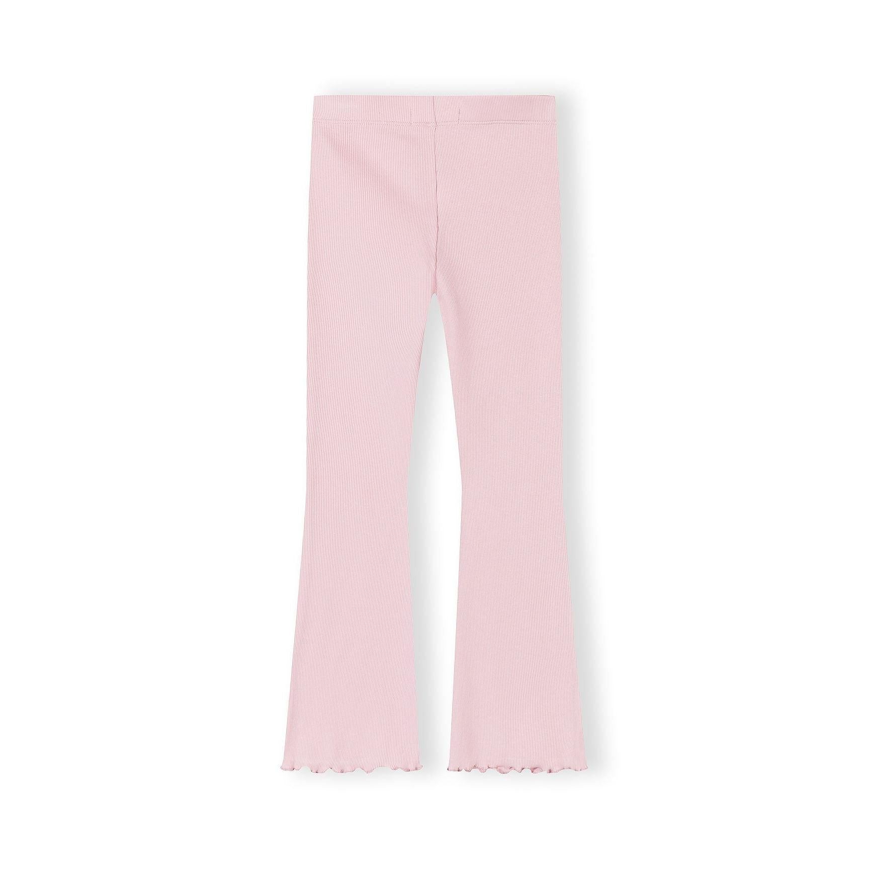 Close-up detail of pink ribbed leggings showing texture and scalloped hem edge