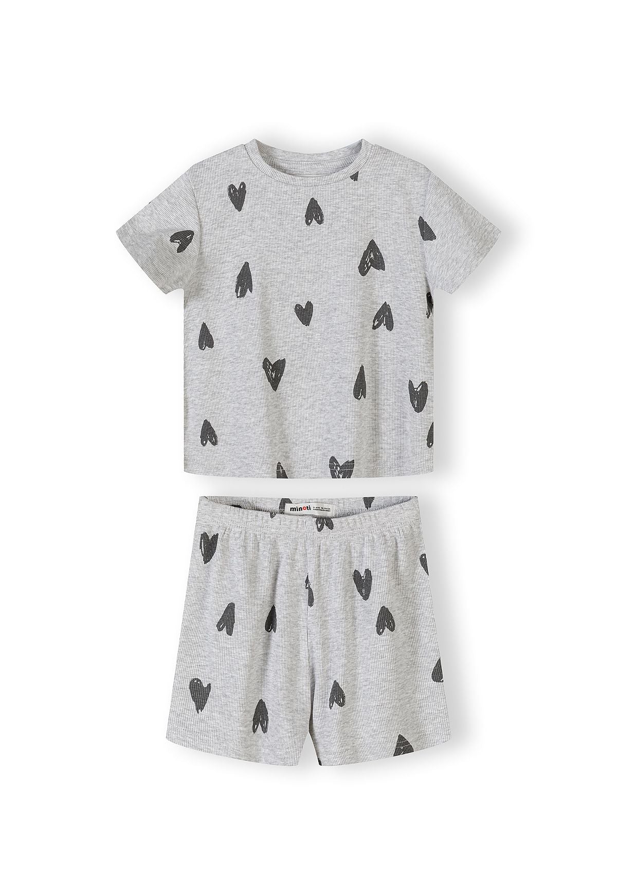 Close-up detail of cream ribbed fabric texture showing hand-drawn black hearts print pattern and crew neckline