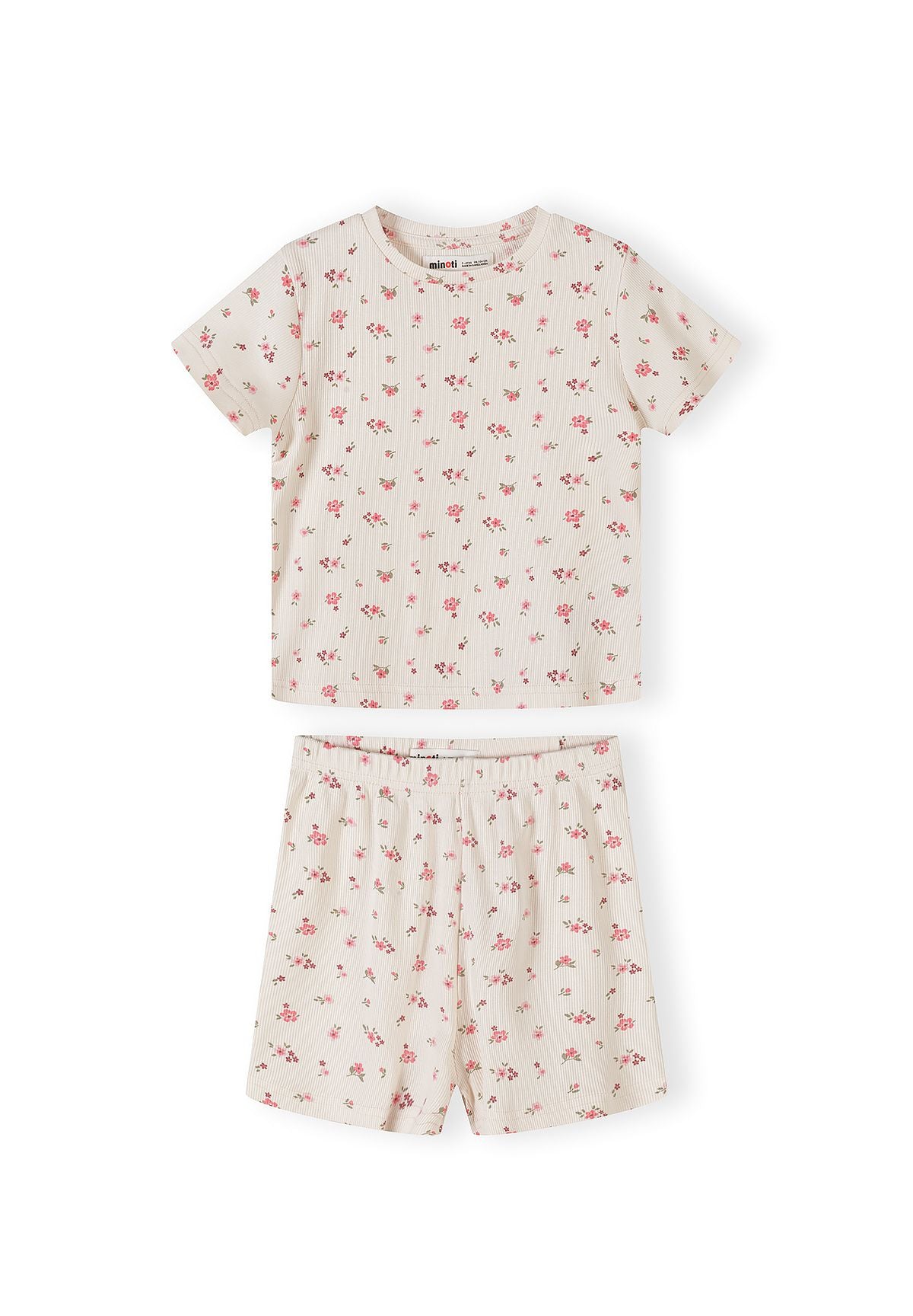 Detail view of pink ribbed fabric texture showing delicate floral print pattern and elastic waistband