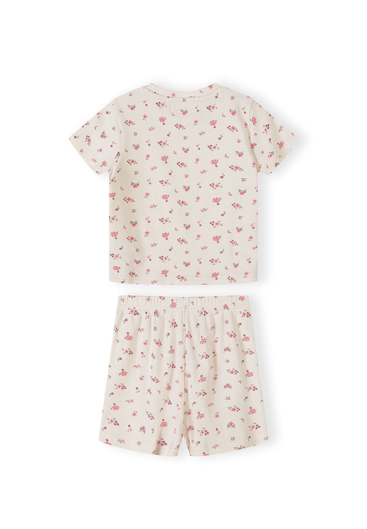 Detail view of pink ribbed fabric texture showing delicate floral print pattern and elastic waistband