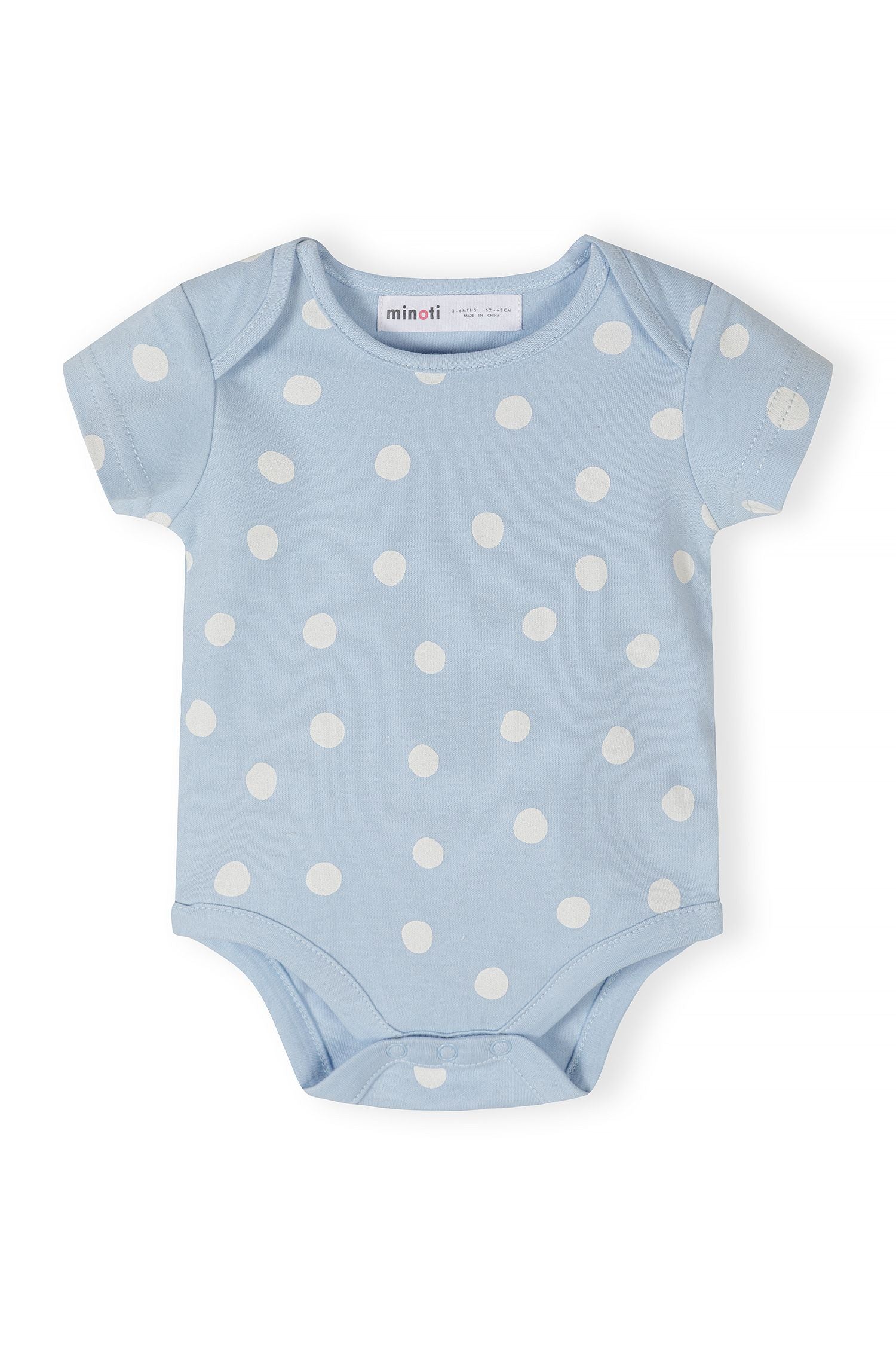 Light blue short sleeve bodysuit with white polka dots, close-up view.