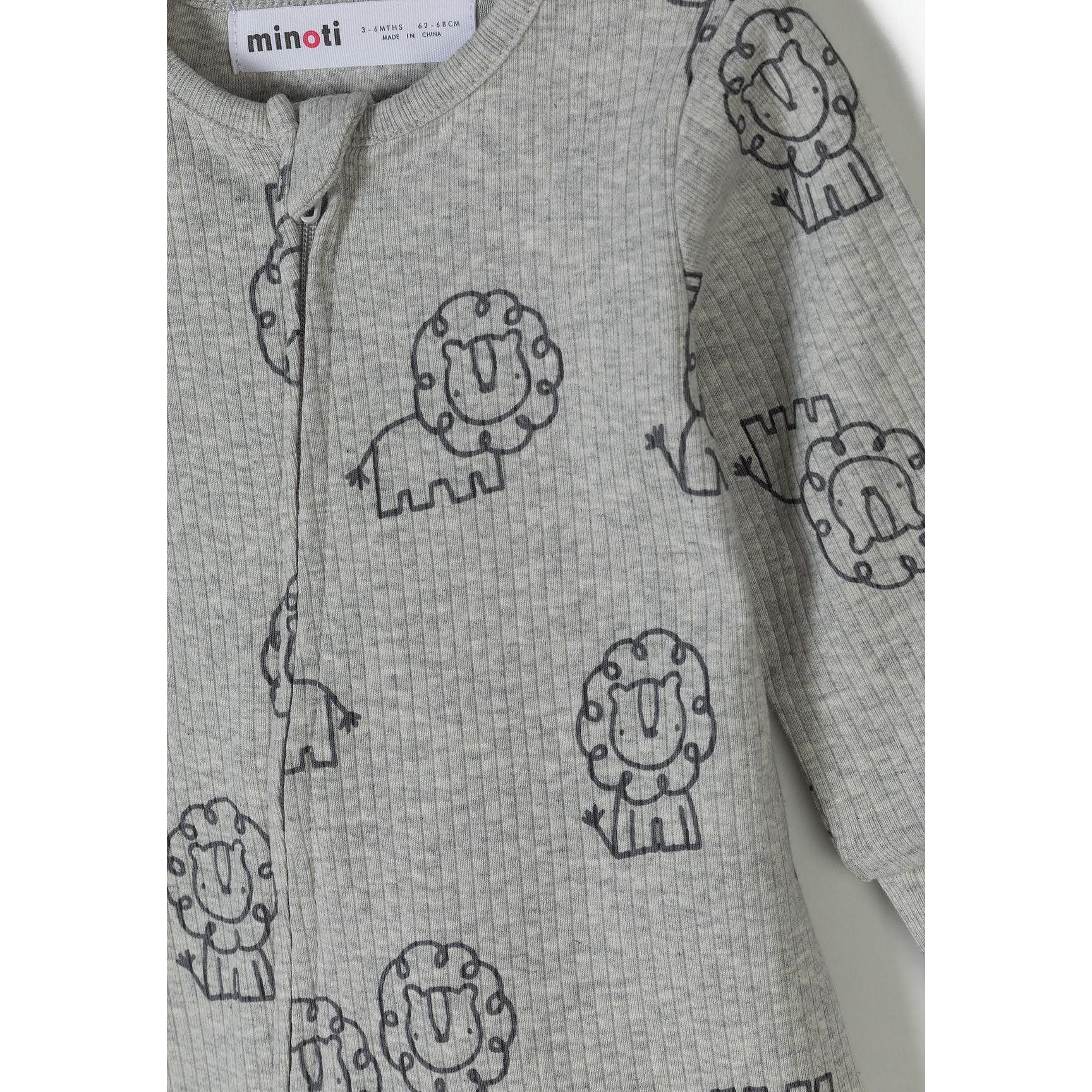 Close-up detail of grey sleepsuit showing lion print pattern, zip closure and ribbed cotton texture with Minoti label visible