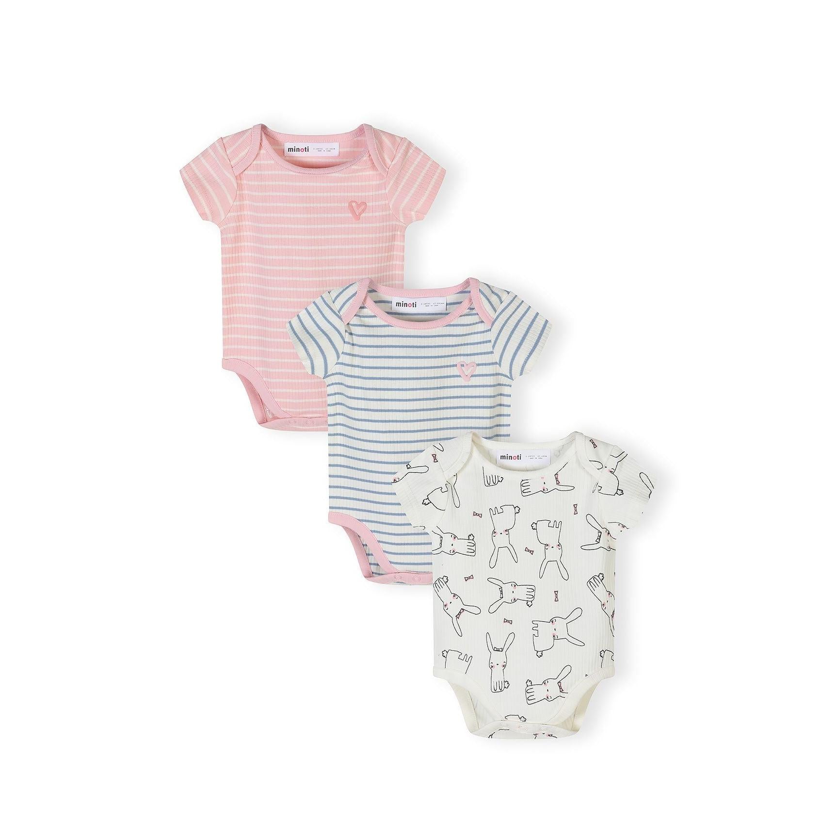 Three baby bodysuits arranged on white background showing pink striped, blue striped and white rabbit print designs