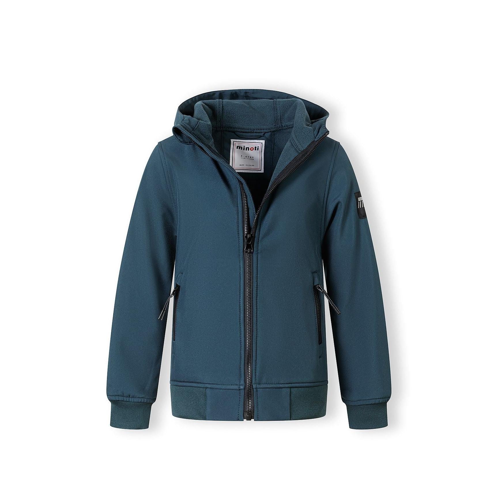 Close-up detail of teal softshell jacket showing black zippered side pocket with zipper pull