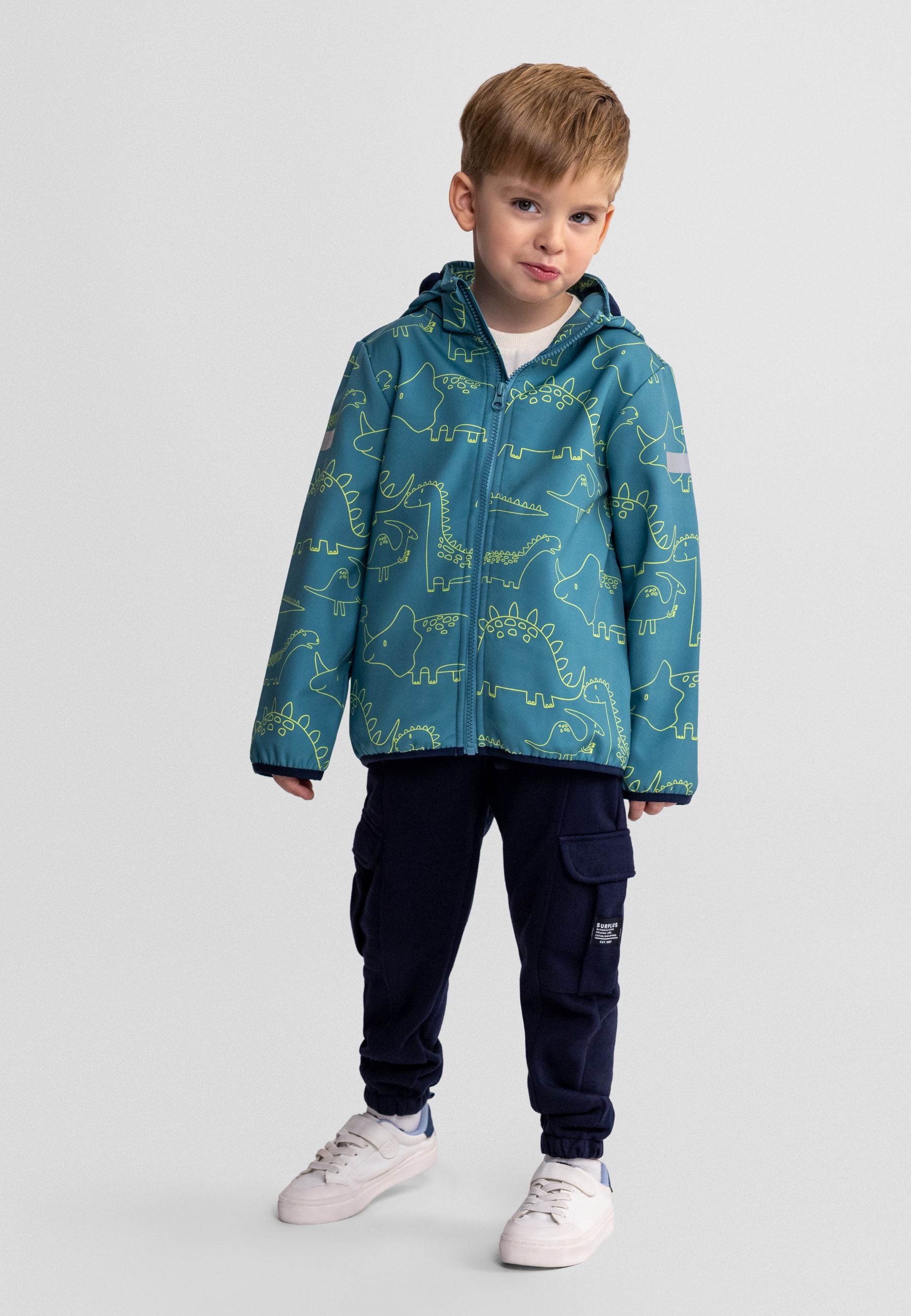 Boys' turquoise softshell jacket with dinosaur print, front view, adjustable hood and full-length zip.
