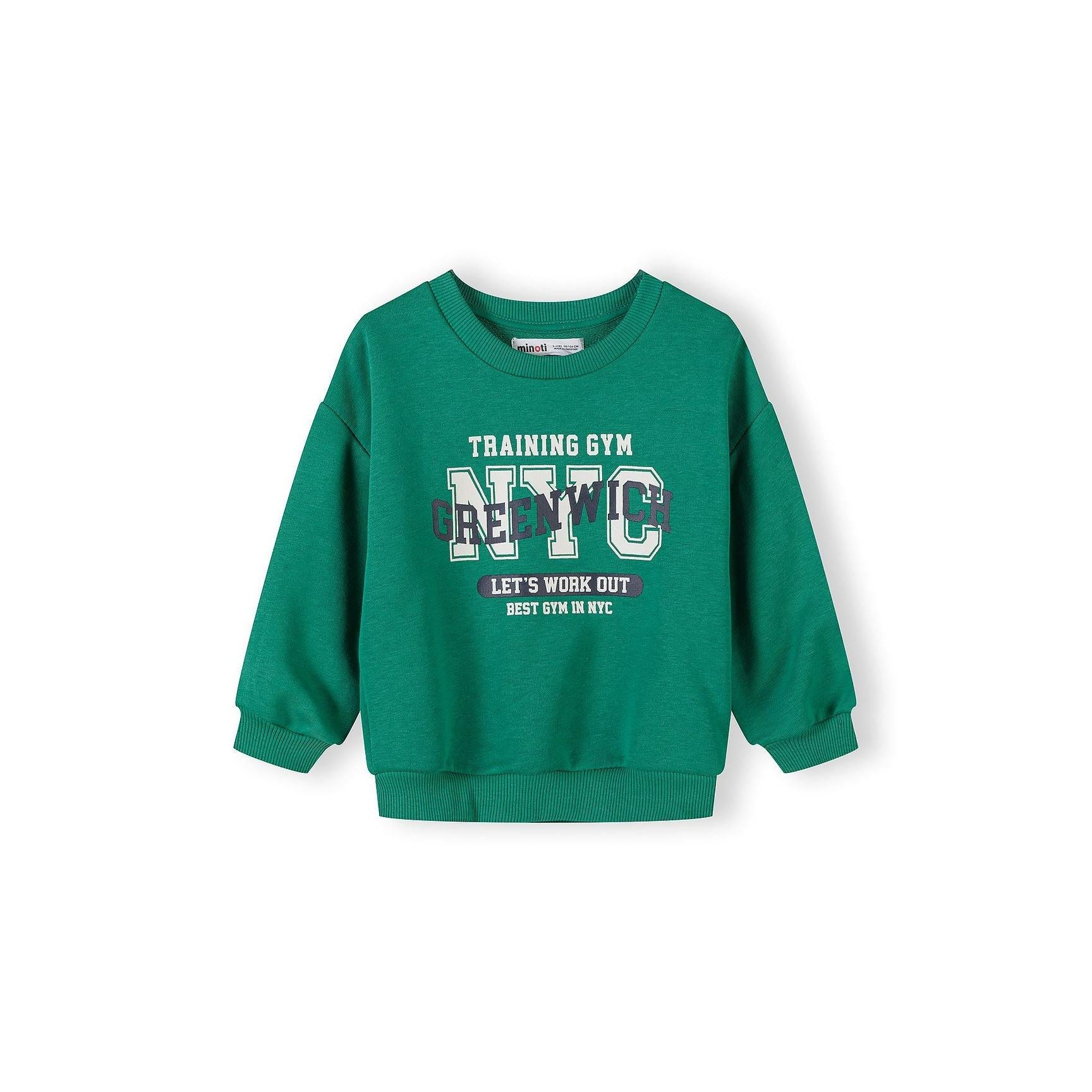 Close-up of green sweatshirt showing NYC Training Gym graphic with Let's Work Out Best Gym in NYC text on ribbed cotton blend fabric